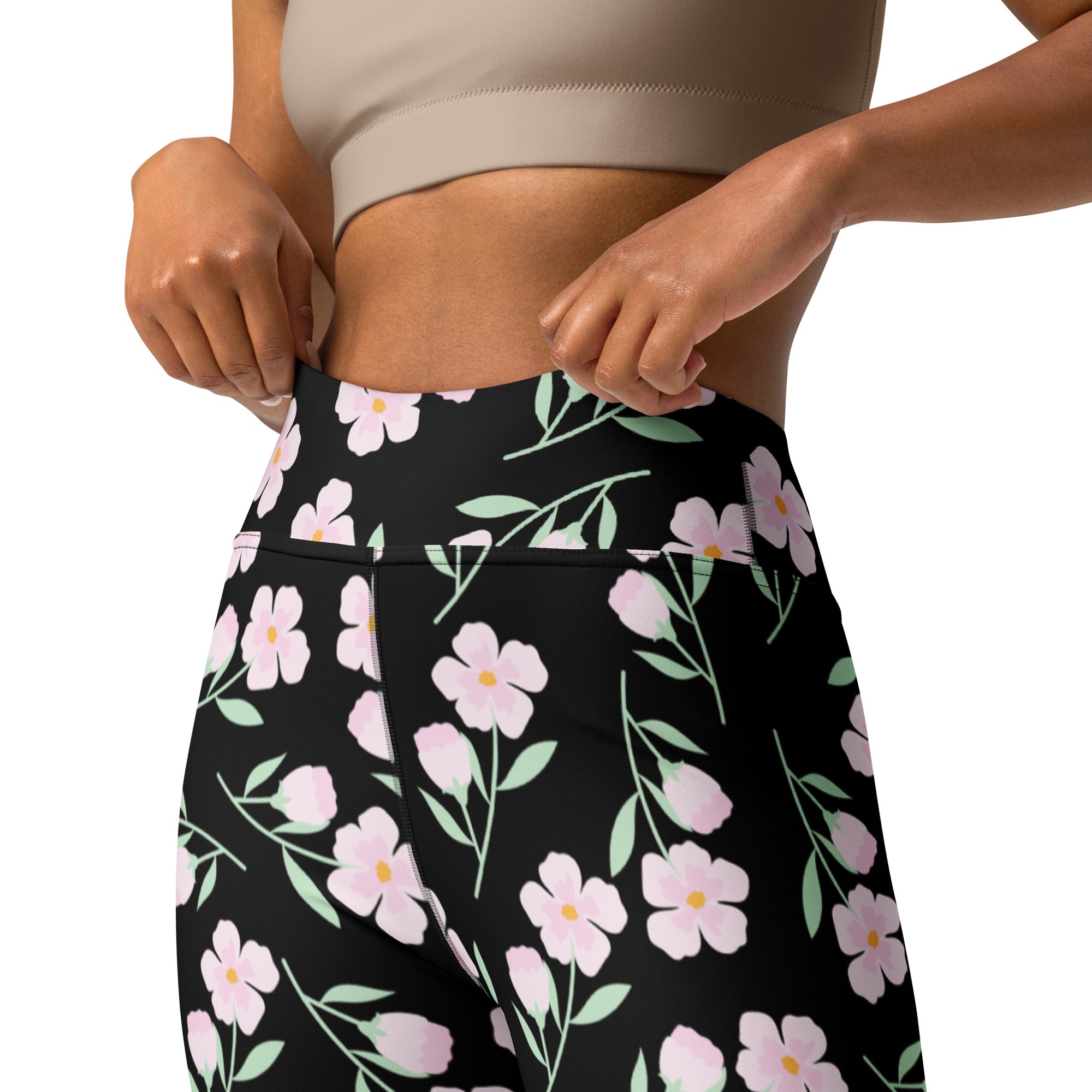 Women’s black floral buttery soft high-waisted yoga leggings with pink flowers yellow centers and green stems