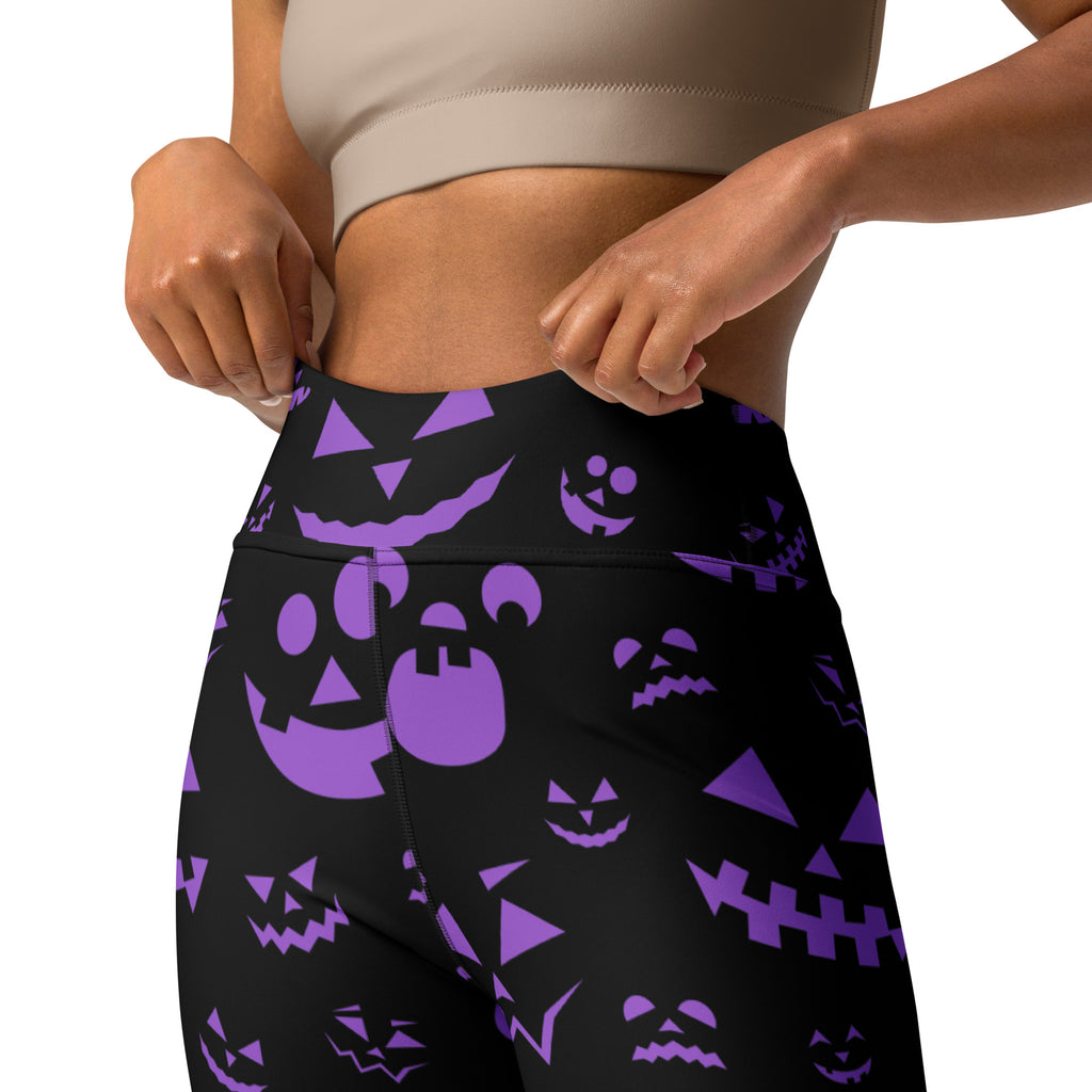 Black high-waisted buttery soft yoga leggings with vibrant purple jack-o-lantern faces for women Halloween wear