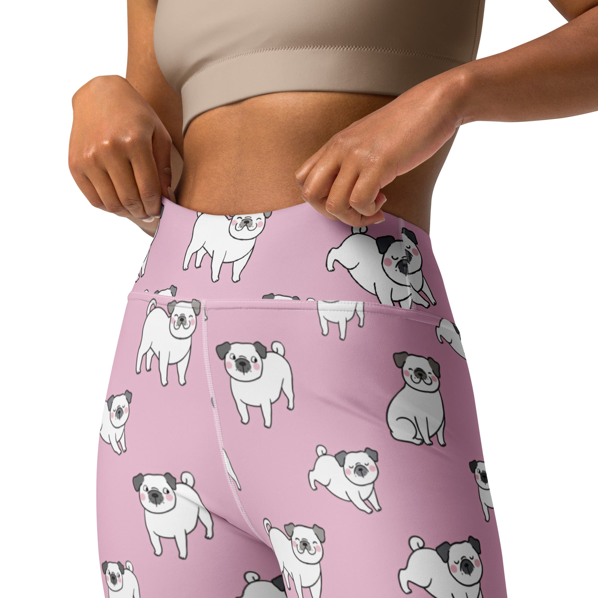 Women’s pink pug buttery soft high-waisted yoga leggings with playful cartoon pug pattern in various poses and shades