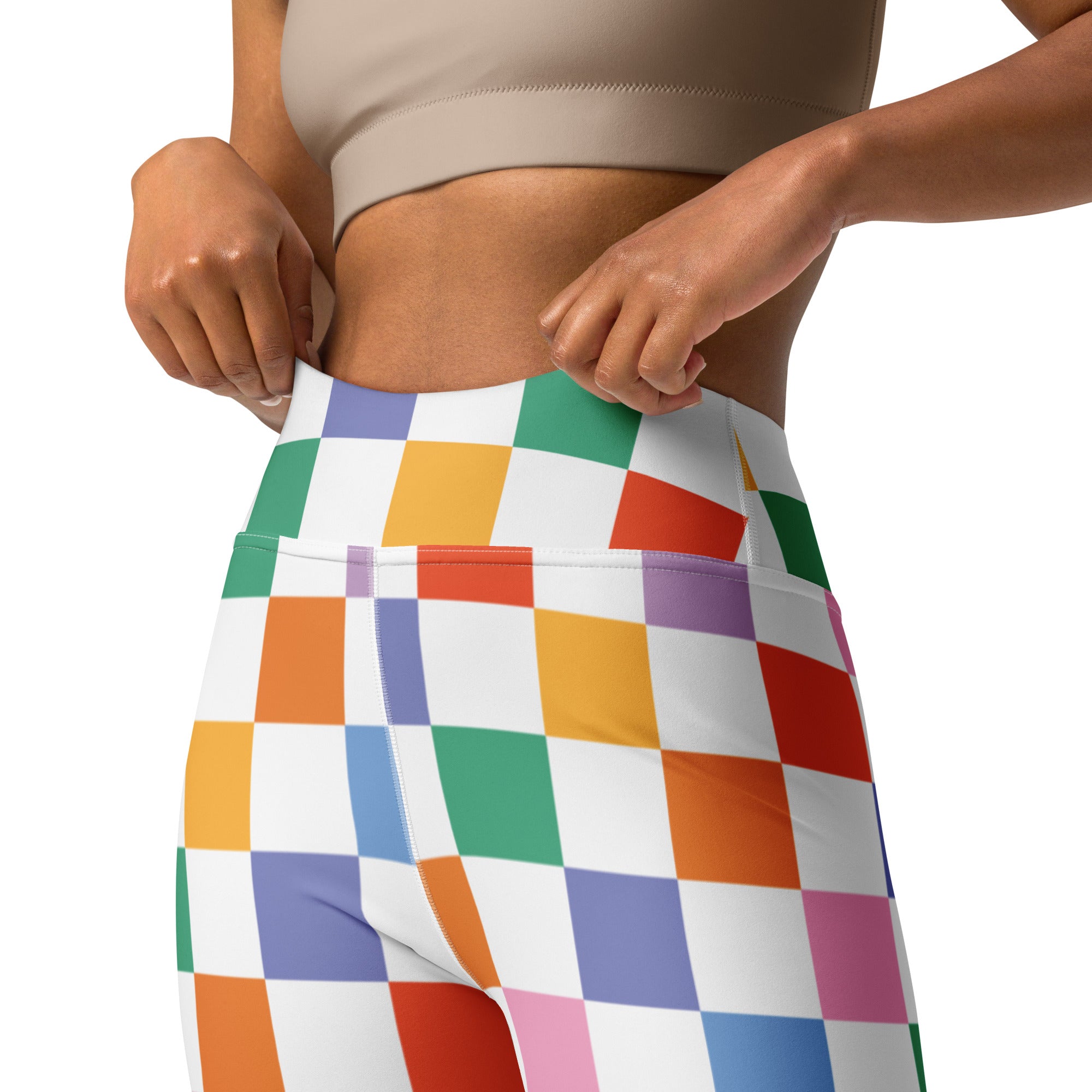 Women’s colorful checkered buttery soft high-waisted yoga leggings with a vibrant multicolored pattern on white base