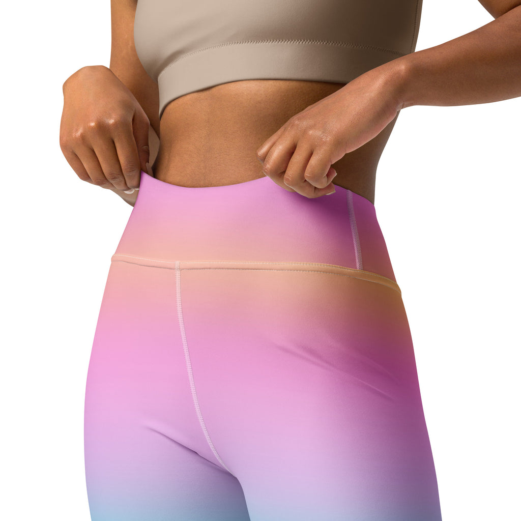 Women’s bright rainbow buttery soft yoga leggings with high waist and smooth gradient from pink to blue
