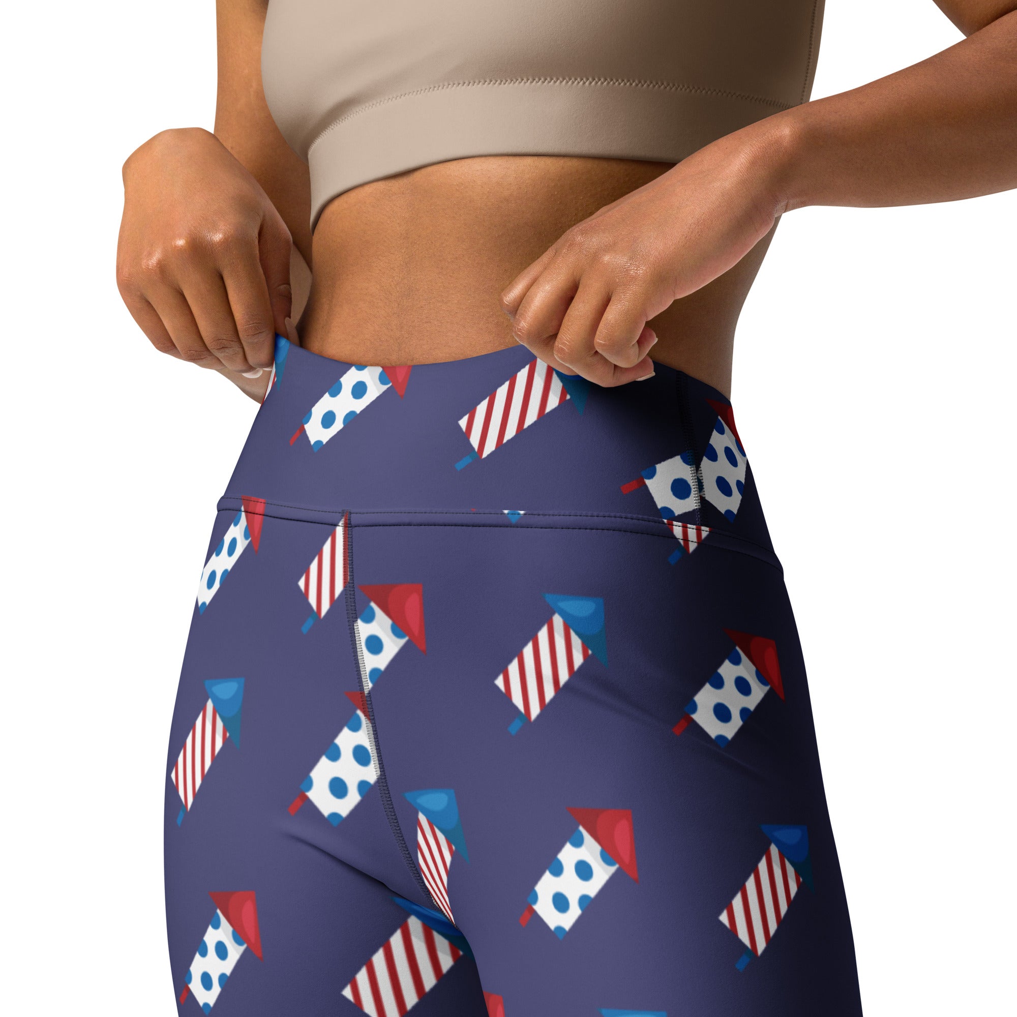 Navy blue high-waisted buttery soft yoga leggings with red white and blue fireworks pattern for women on 4th of July