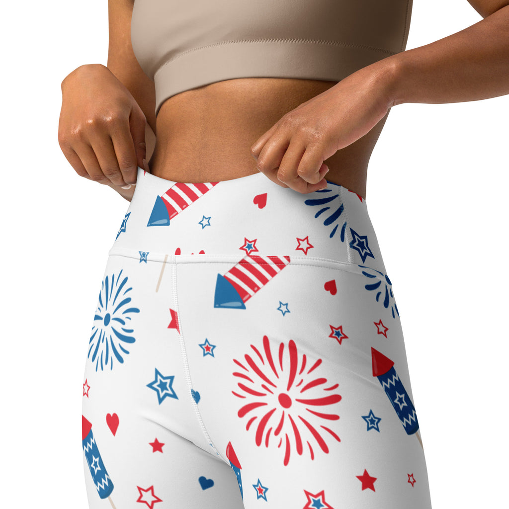 White high-waisted buttery soft yoga leggings with vibrant red white and blue fireworks and rocket pattern