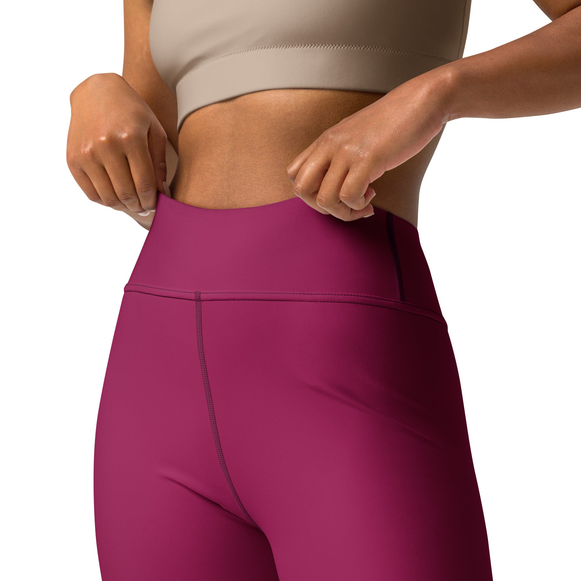 Women’s dark magenta buttery soft yoga leggings with seamless stretchy fabric and subtle side seam stitching