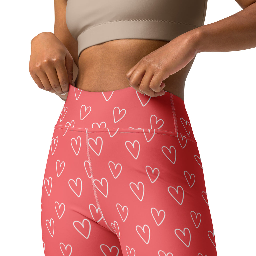 Women’s pink high waisted buttery soft yoga leggings with white heart pattern quick drying comfort