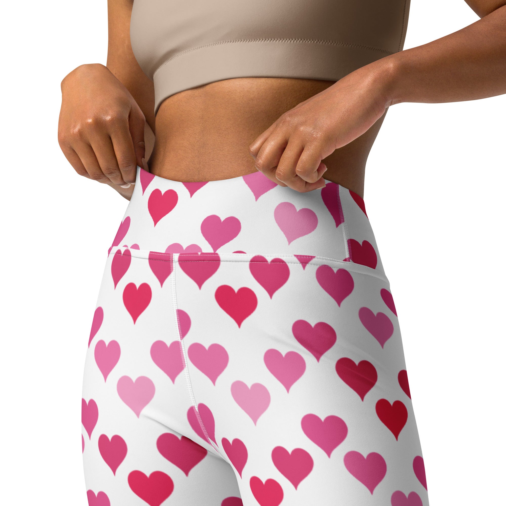 Women’s white high-waisted buttery soft yoga leggings with pink and red heart pattern quick drying comfort