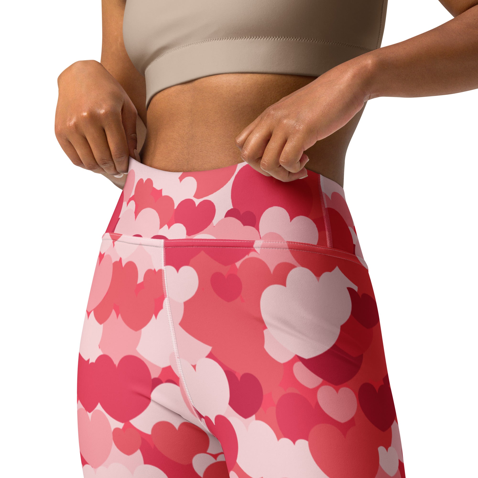 Women’s pink and white heart-patterned buttery soft high waisted yoga leggings with quick drying fabric