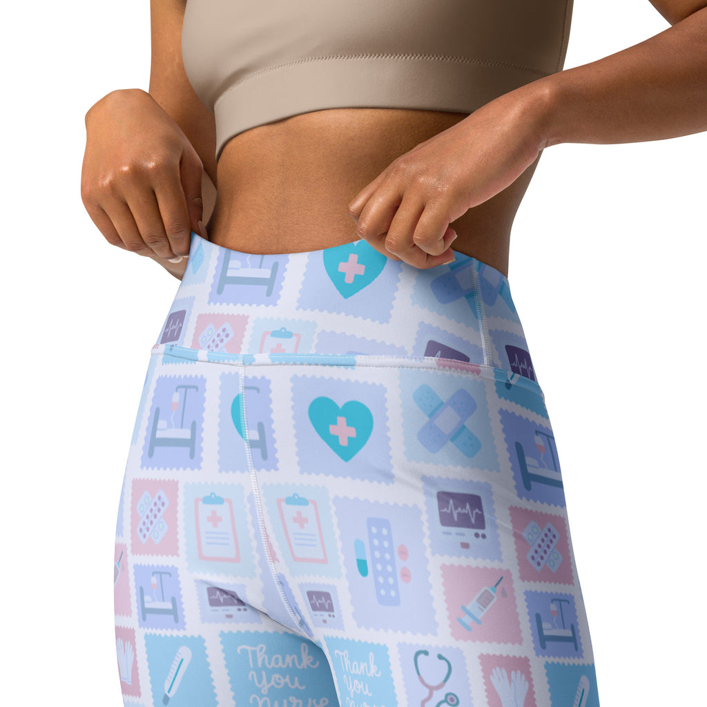 Women’s blue nurse icon buttery soft high waisted yoga leggings in light blue and pink with medical illustrations