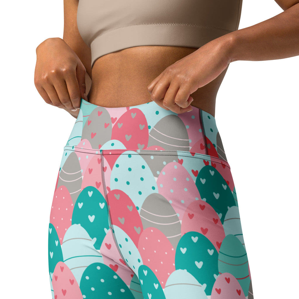 Women’s pastel pink and teal high waisted buttery soft yoga leggings with playful heart adorned easter egg pattern