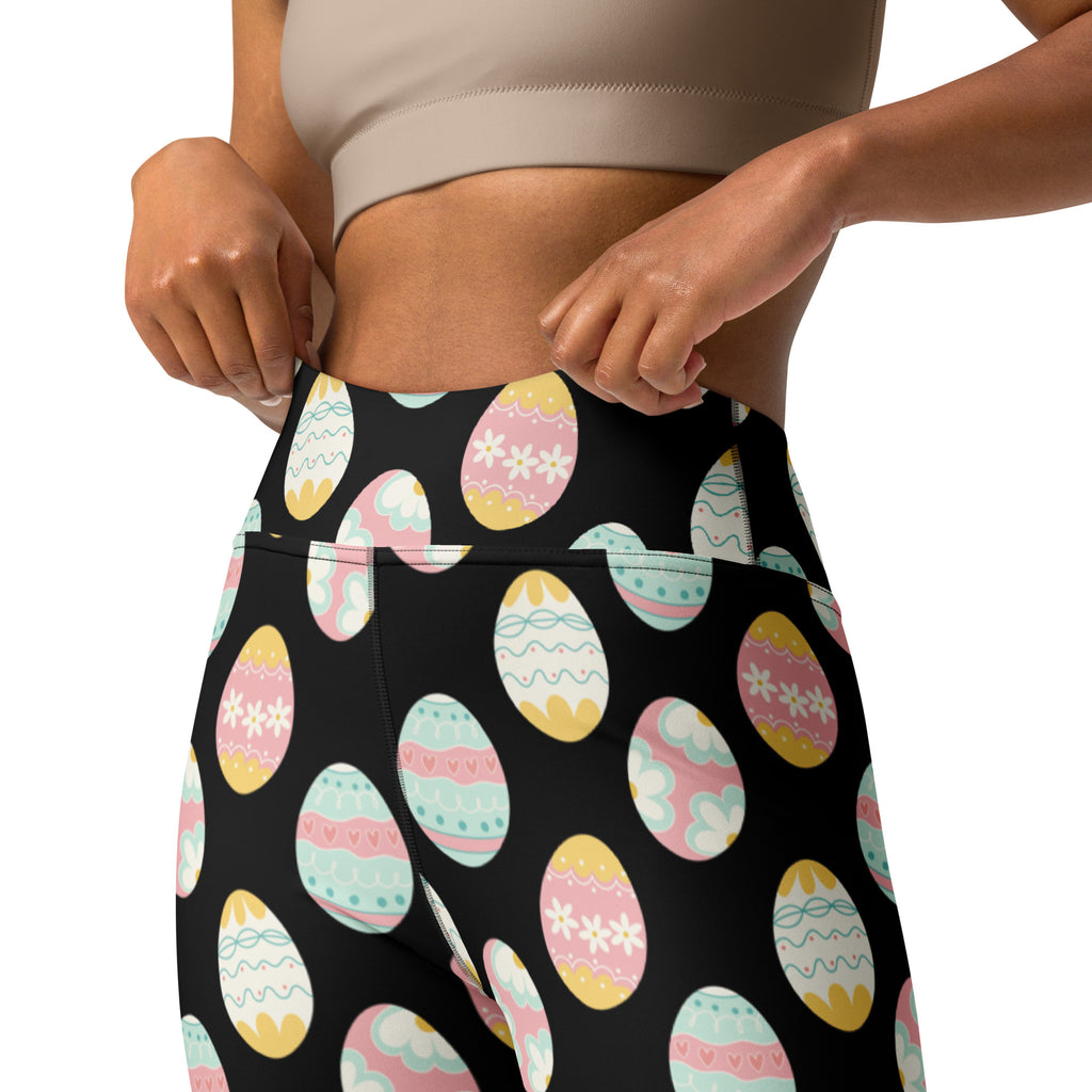 Black high-waisted buttery soft yoga leggings with pastel easter egg patterns for quick drying comfort