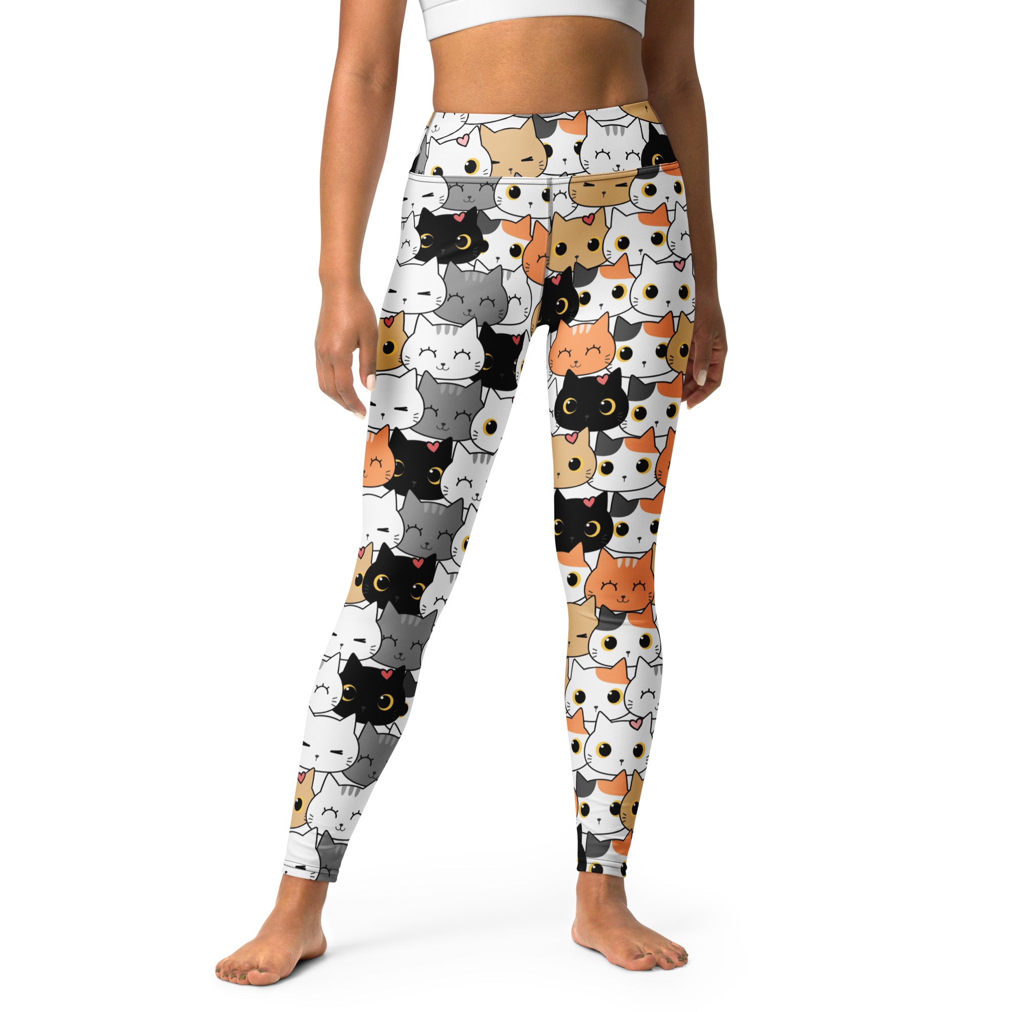 White buttery soft yoga leggings for women with a playful multicolor cartoon cat face pattern