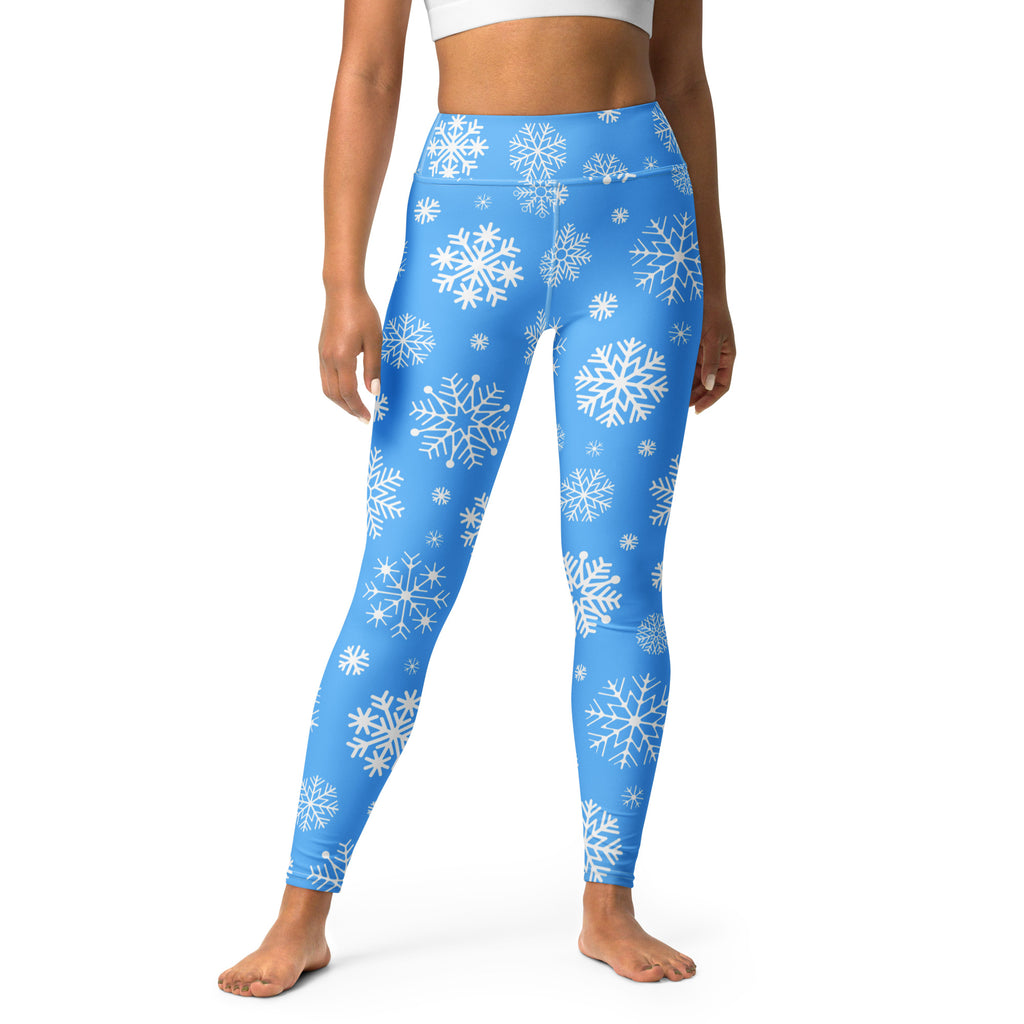Blue high waisted buttery soft yoga leggings for women with white snowflake pattern for winter workouts