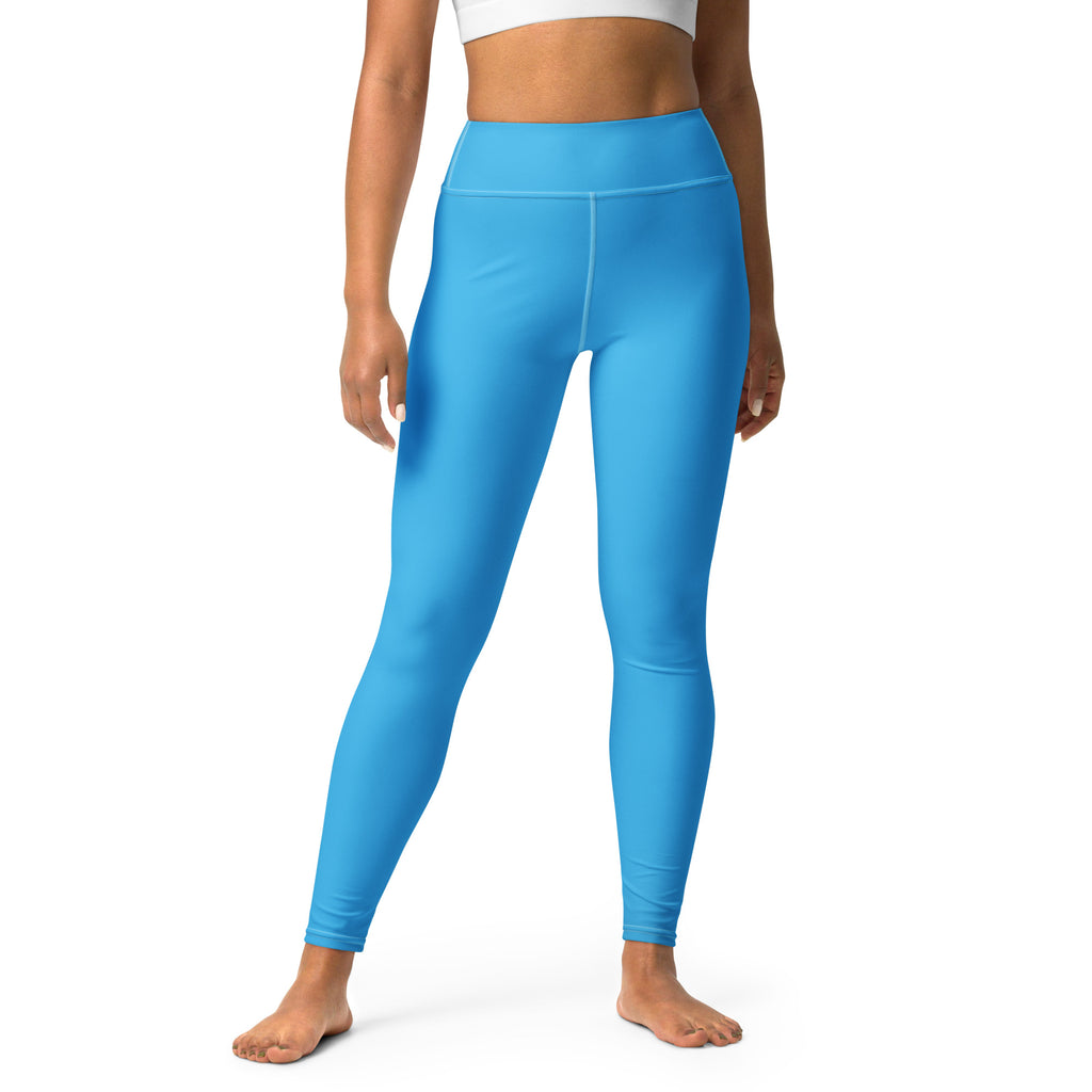 Bright blue high-waisted womens yoga leggings made of buttery soft stretchy form-fitting fabric