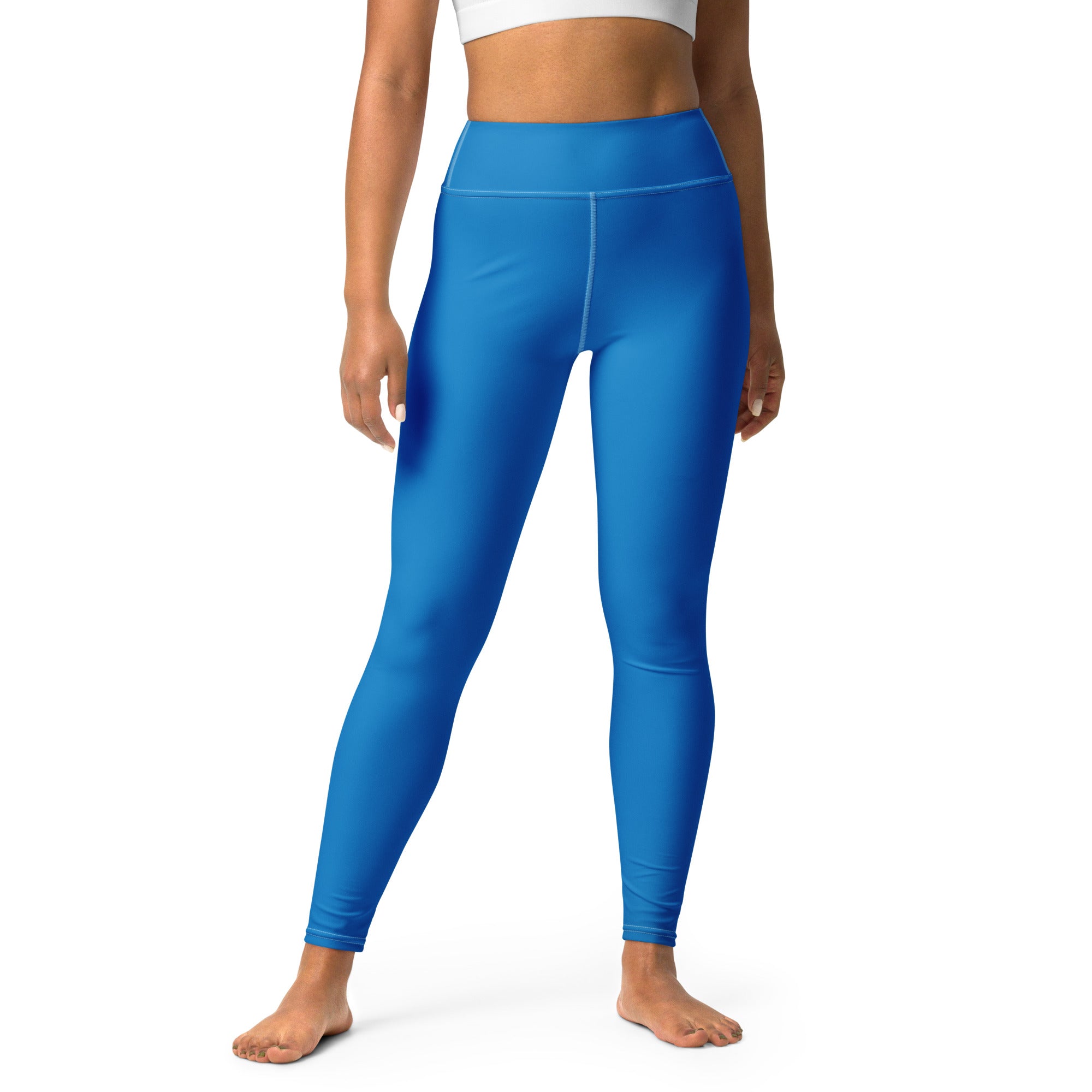Bright blue high-waisted buttery soft yoga leggings with smooth stretchy fabric for women