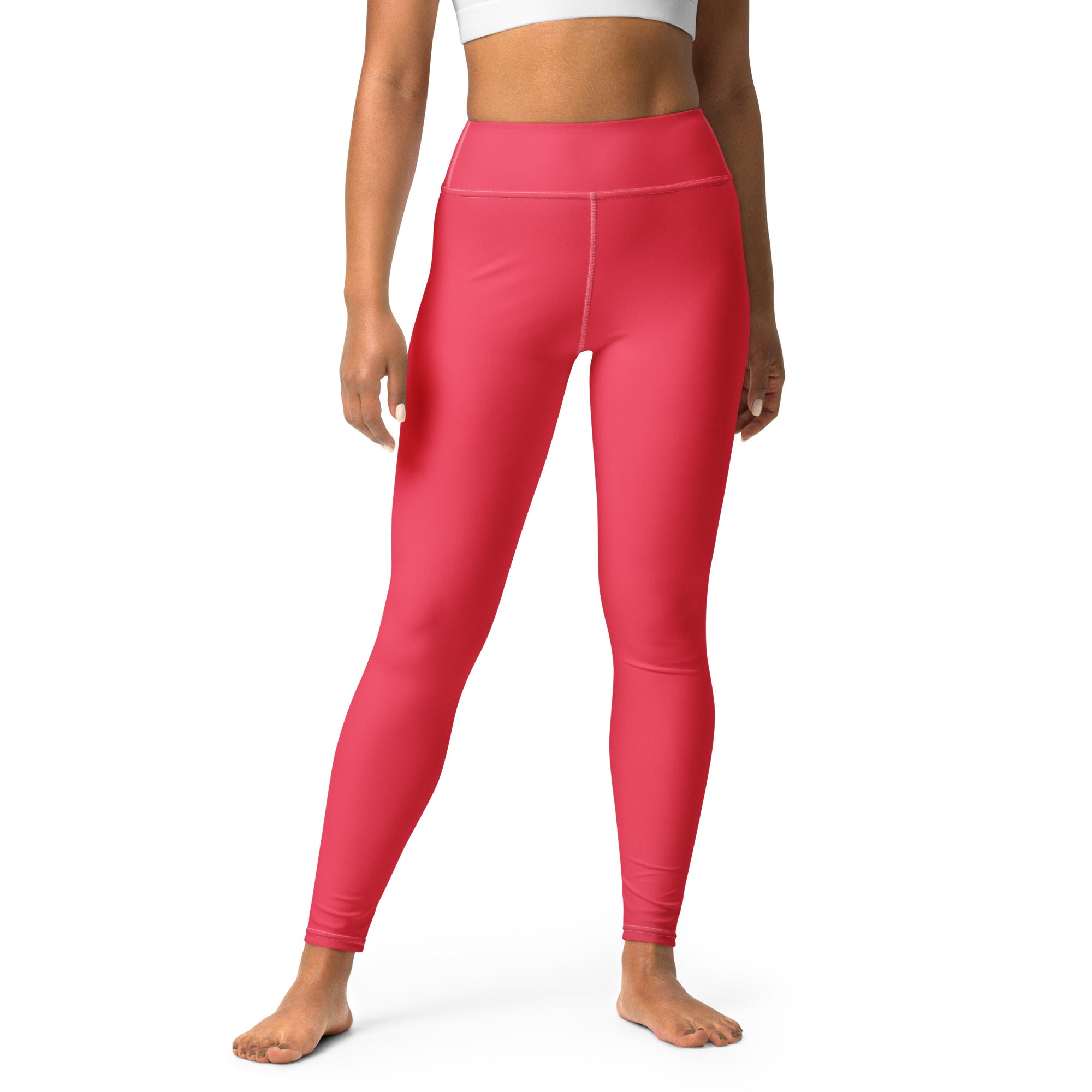 Women’s crimson pink buttery soft yoga leggings in bright coral pink high-waisted stretchy form-fitting fabric