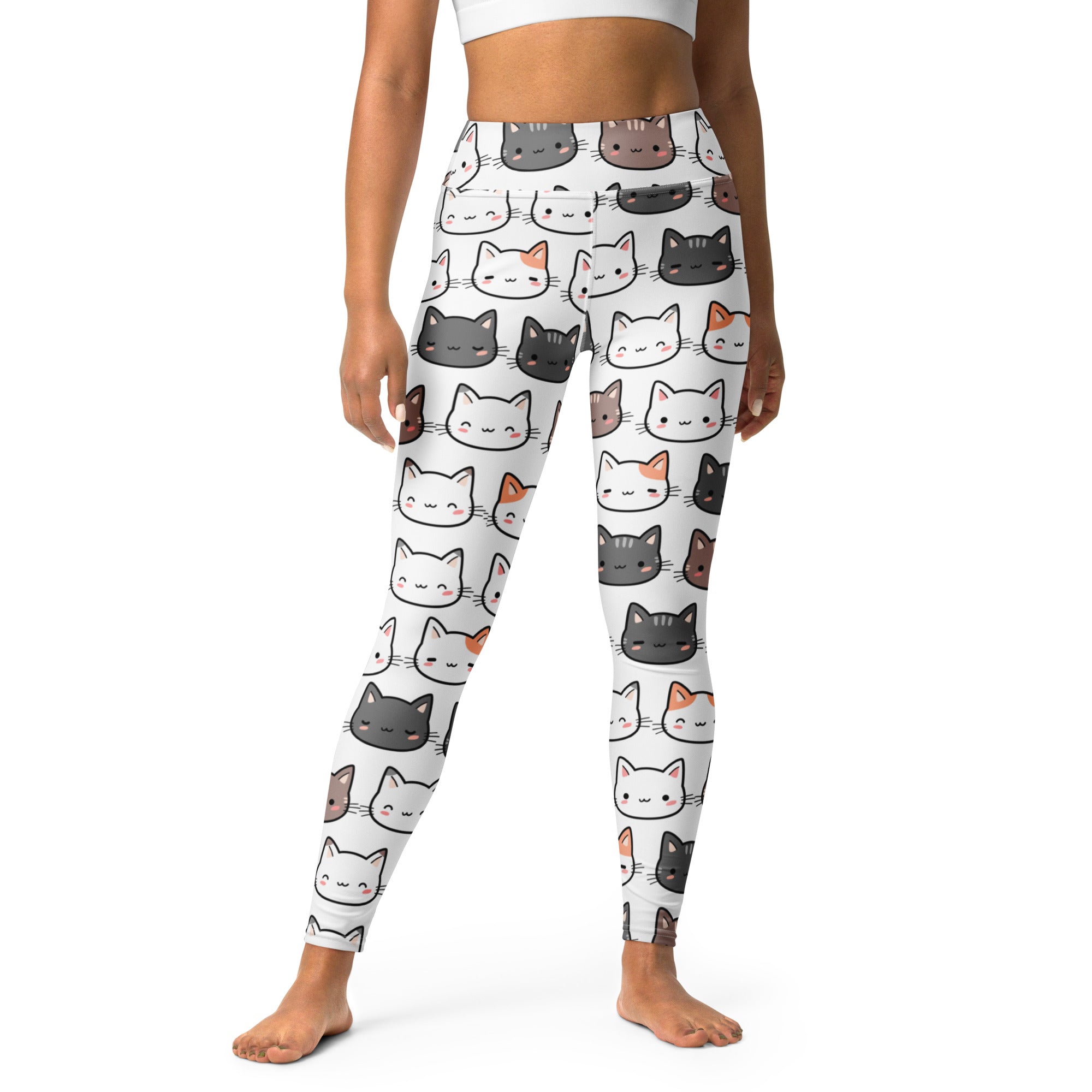 White women’s buttery soft yoga leggings with playful multicolor cartoon cat pattern