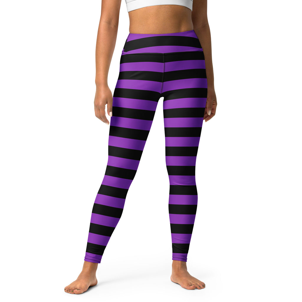 Women’s purple and black striped high-waisted buttery soft yoga leggings for halloween visible from front side