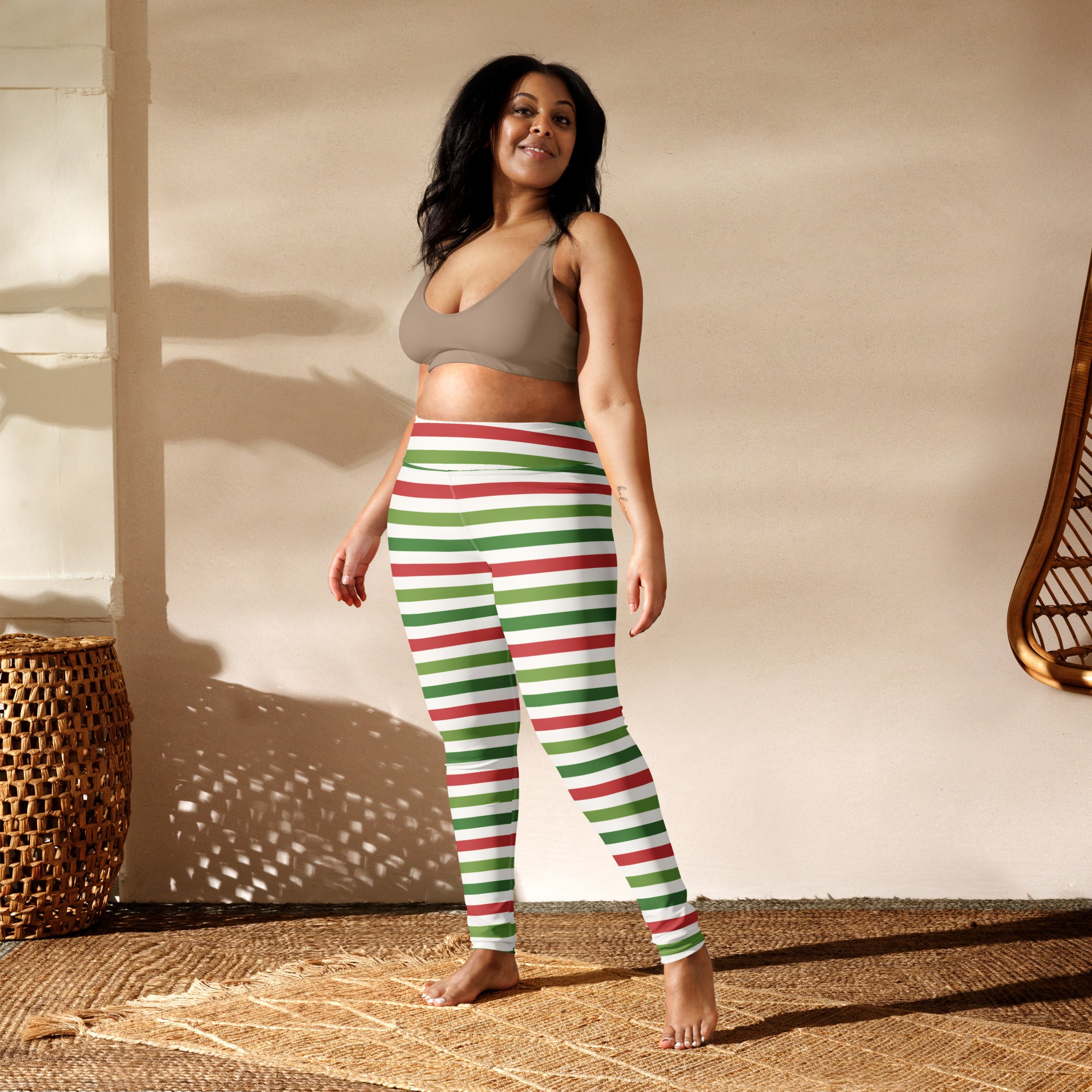 Women’s striped Christmas buttery soft yoga leggings in red and green horizontal stripes with a snug, form-fitting design