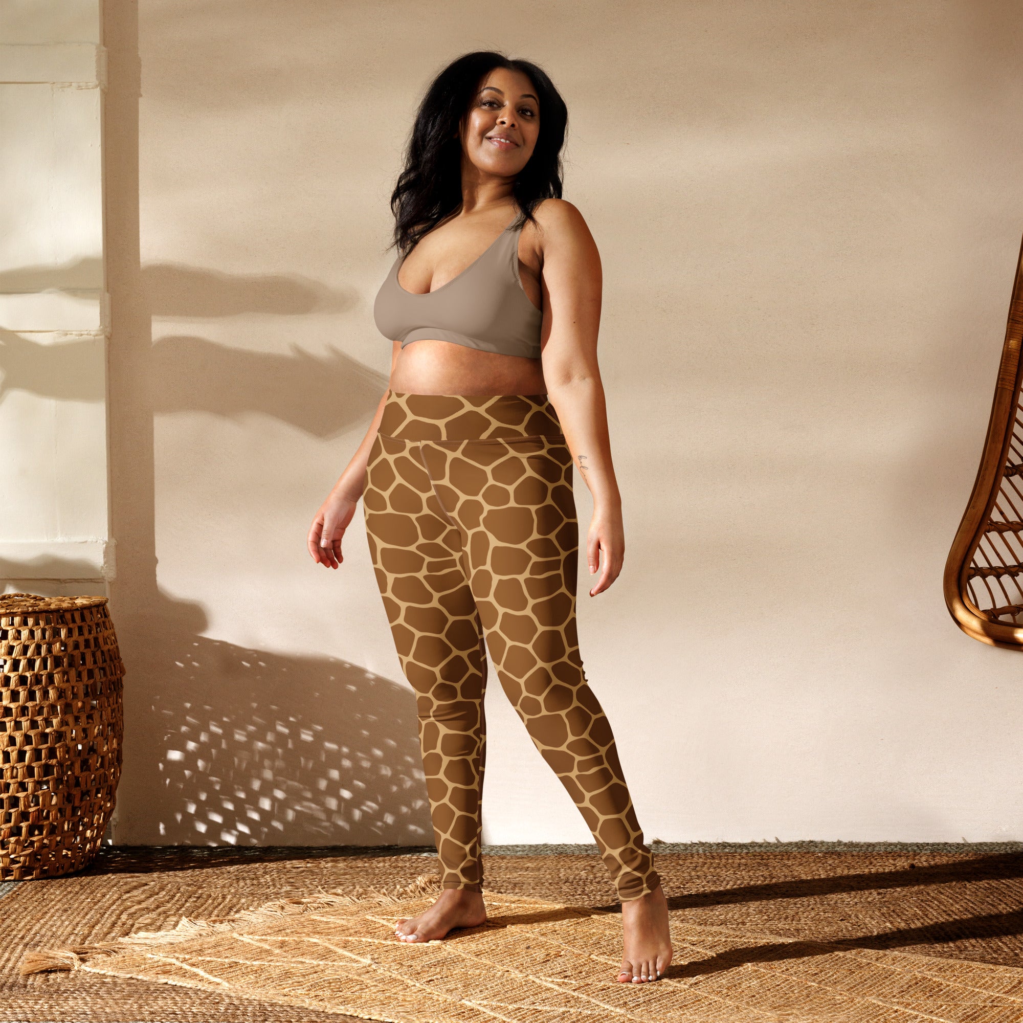 Brown giraffe print high waisted buttery soft yoga leggings for women shown from the back side