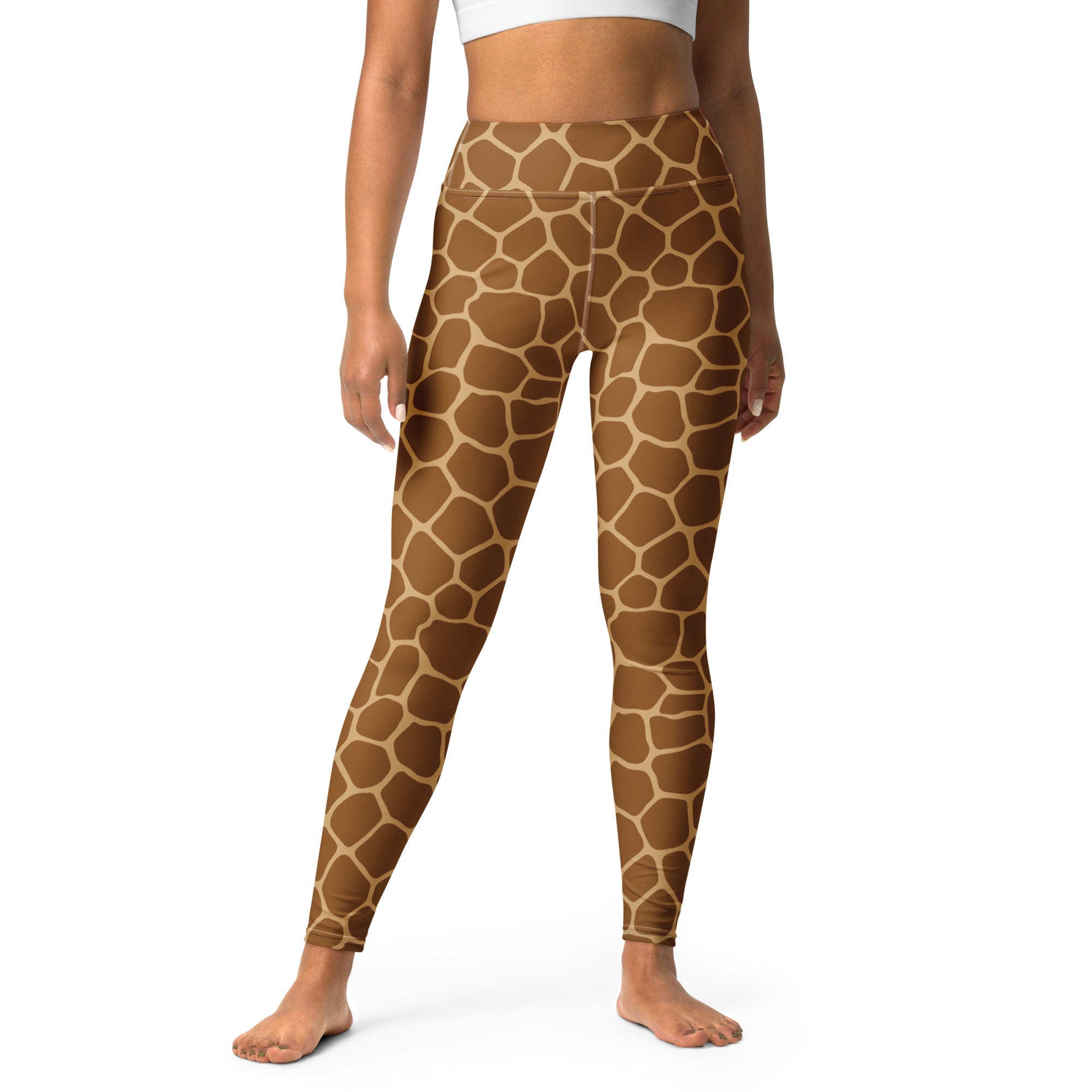 Women’s giraffe print buttery soft high-waisted yoga leggings in brown and cream pattern showing the back side