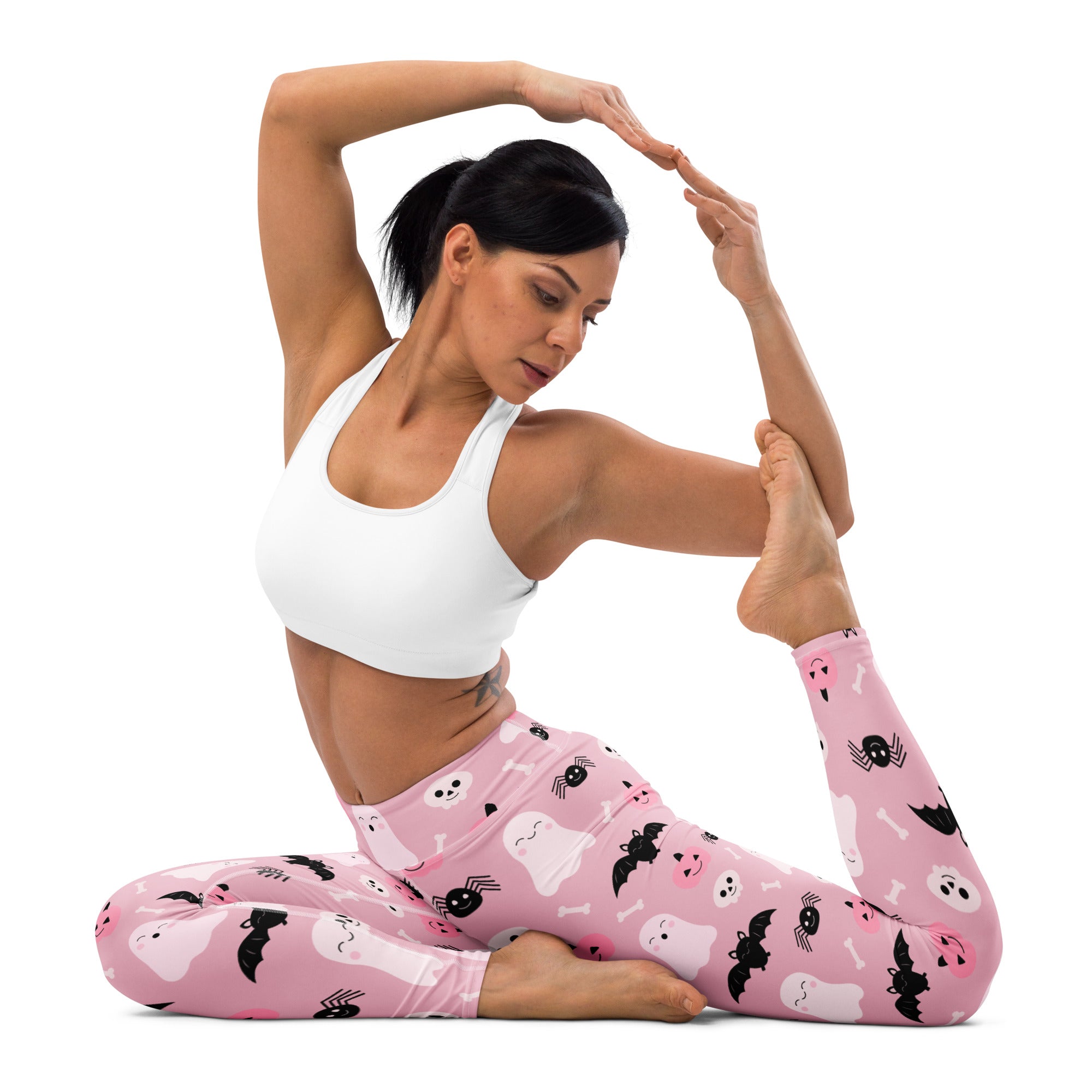 Women’s pink buttery soft yoga leggings with black halloween ghost bats and spider prints