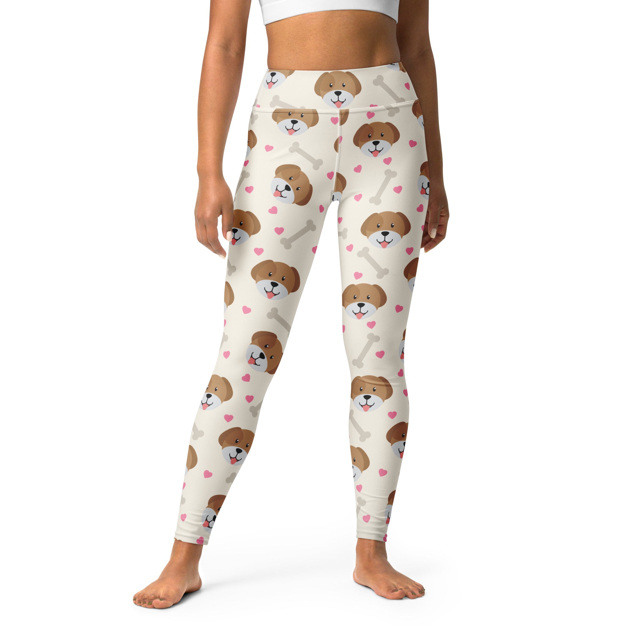 Women’s cream-colored buttery soft yoga leggings with playful brown puppy faces pink hearts and white bones print