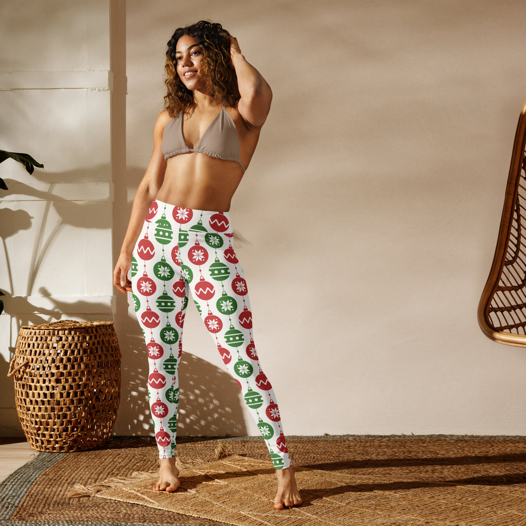 White women’s buttery soft yoga leggings with festive red and green christmas ornament and snowflake pattern