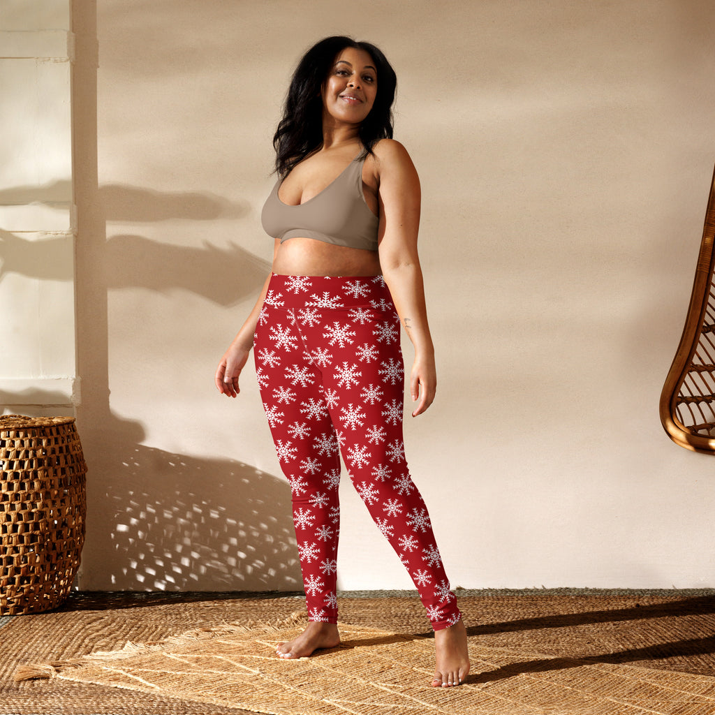 Women’s red buttery soft yoga leggings with white snowflake pattern designed for comfort and flexibility