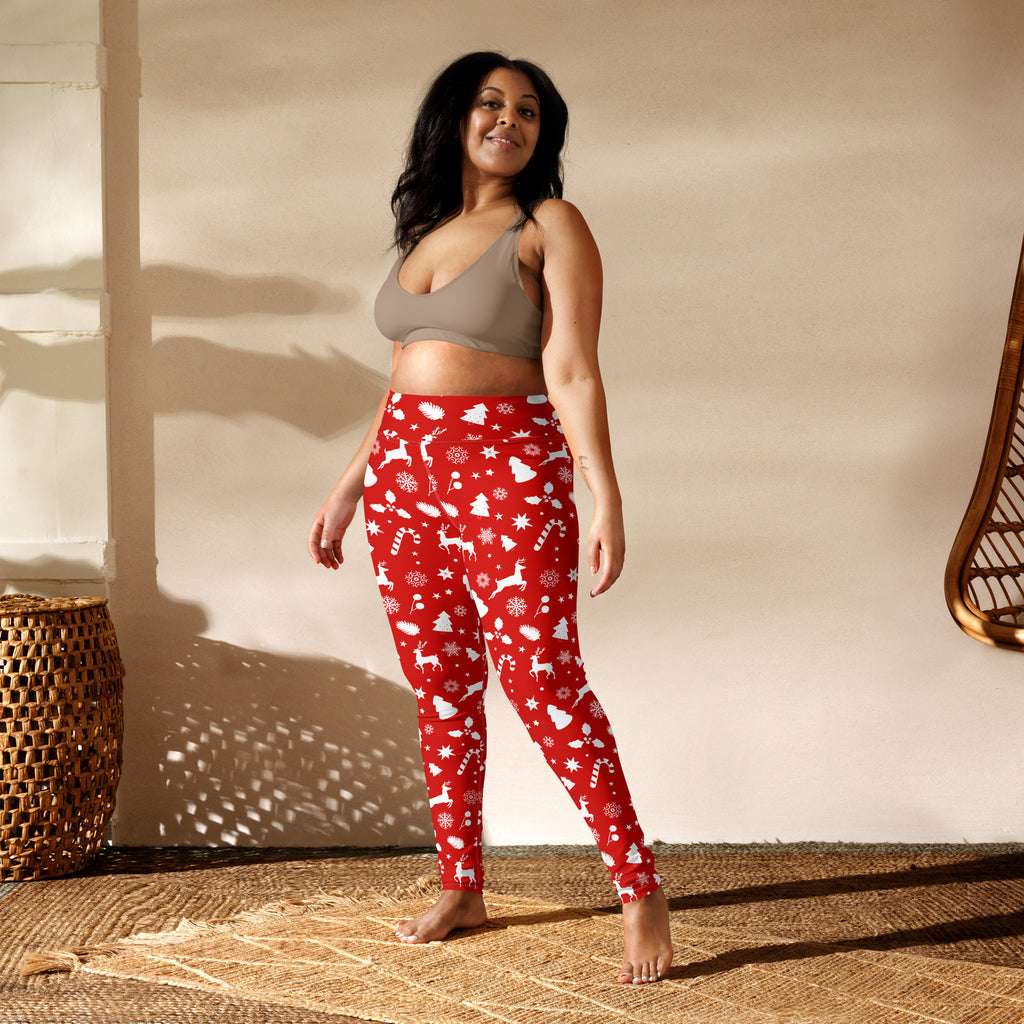 Women’s red christmas buttery soft yoga leggings with white reindeer snowflakes and candy cane patterns