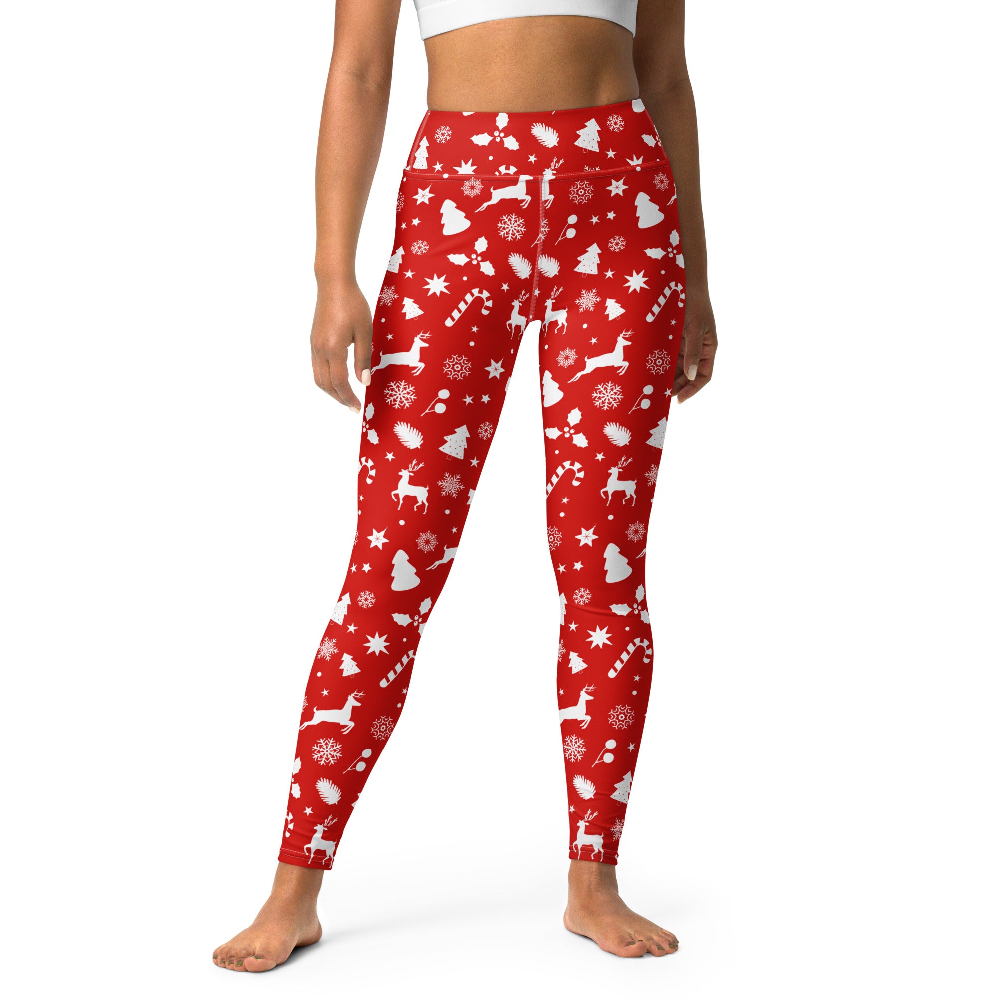 Women’s red christmas buttery soft high-waisted yoga leggings with white reindeer candy canes and snowflakes pattern