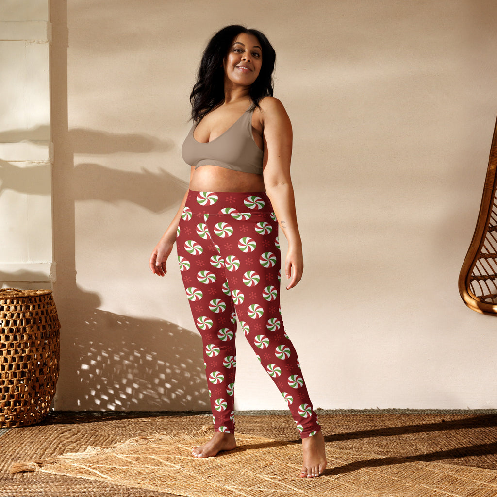 Women’s buttery soft red yoga leggings with white and green peppermint candy pattern for christmas wear