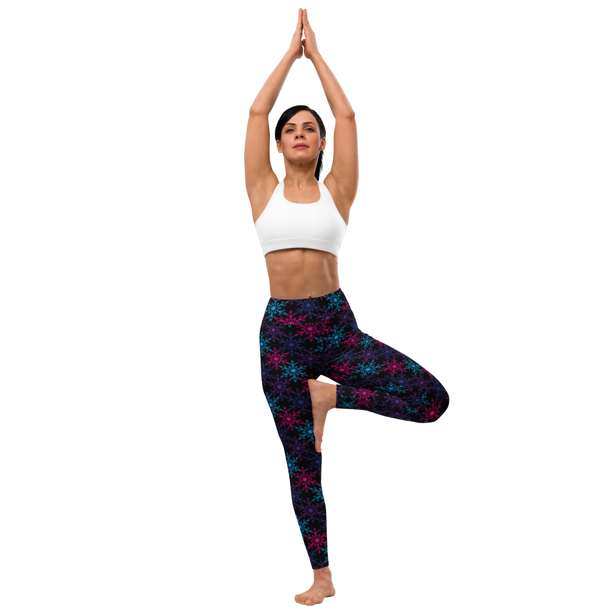 Women’s neon snowflake winter buttery soft black leggings with vibrant pink and teal snowflake pattern for yoga