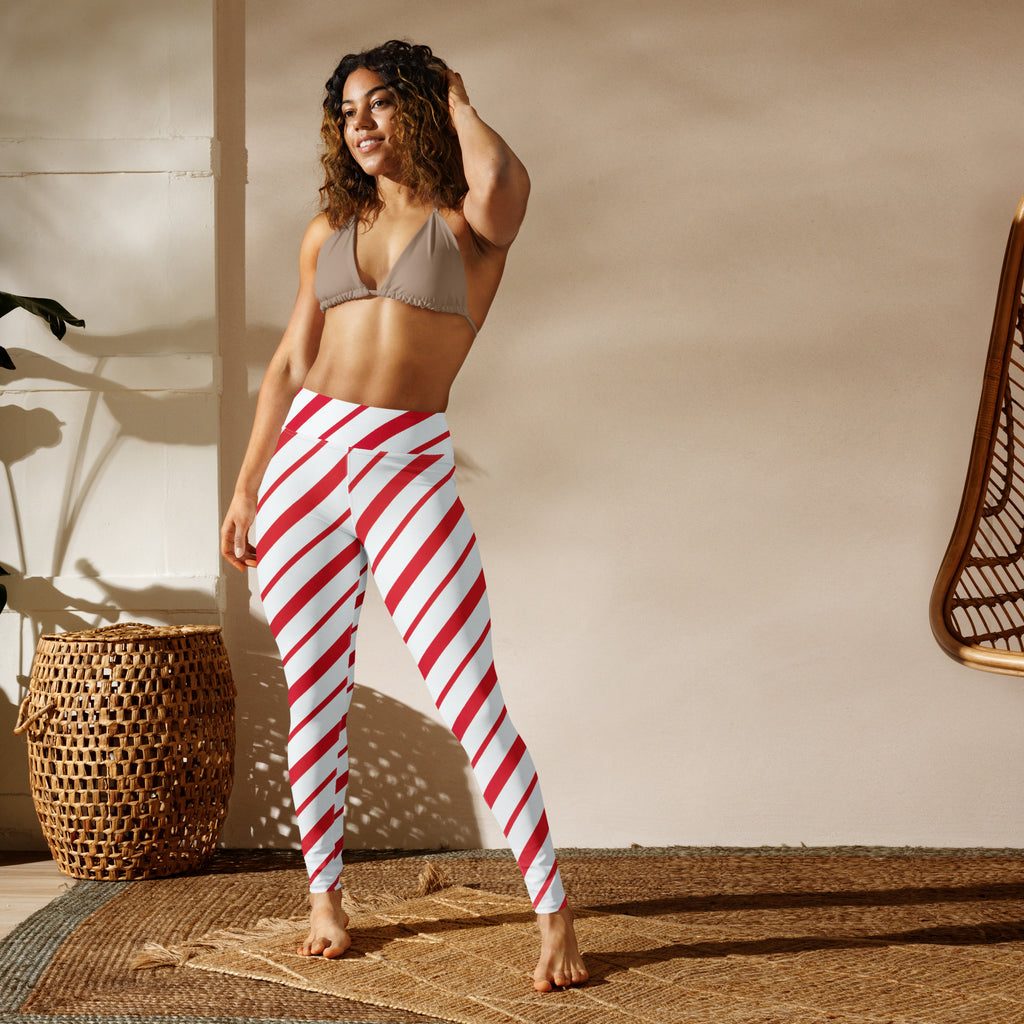 Women’s candy cane stripe buttery soft high-waisted leggings in red and white diagonal stripes for yoga and casual wear