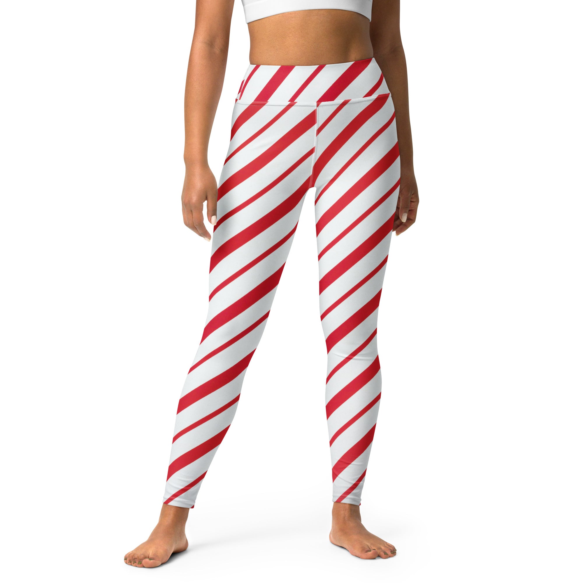 Women’s candy cane stripe buttery soft yoga leggings with red and white diagonal stripes and high waist design
