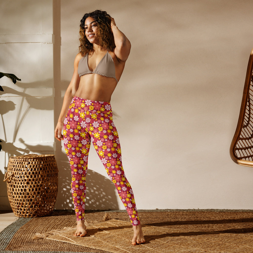 Women’s red floral buttery soft yoga leggings with vibrant pink stretchy fabric and yellow and white blossoms