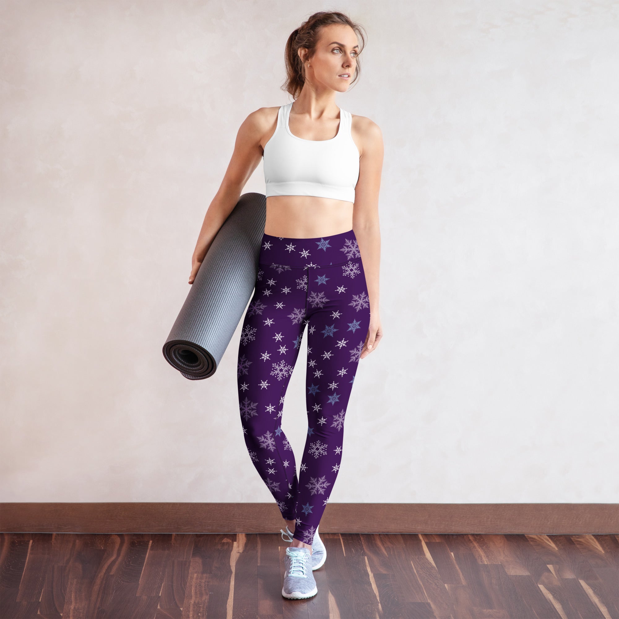 Women’s purple buttery soft yoga leggings with white and light blue snowflake pattern