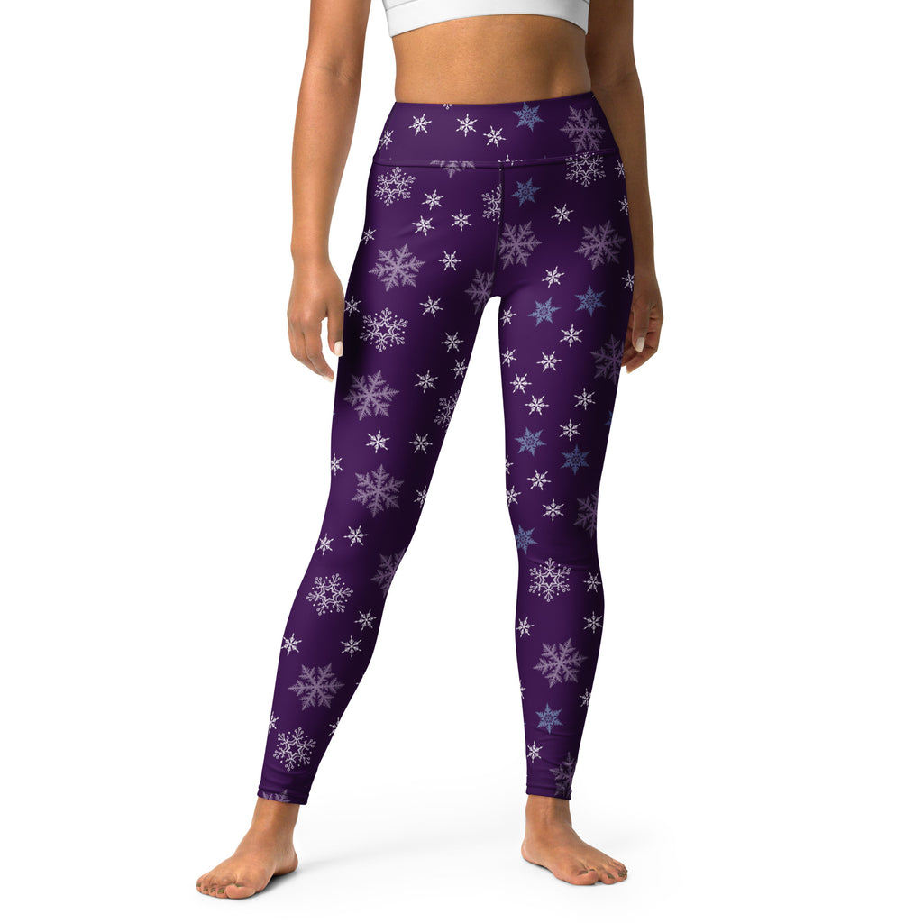Women’s purple snowflake high-waisted leggings made of buttery soft fabric ideal for yoga and casual wear