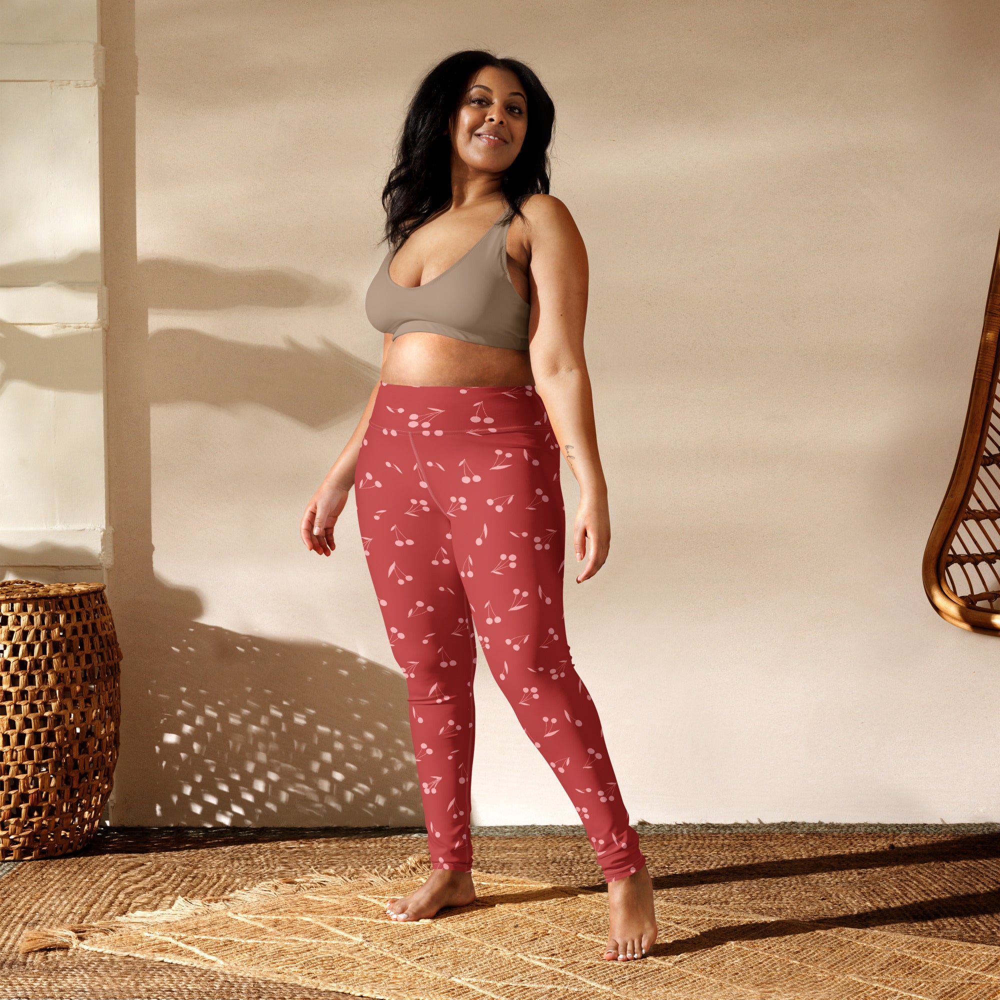 Women’s red cherry print high-waisted buttery soft yoga leggings showing front view