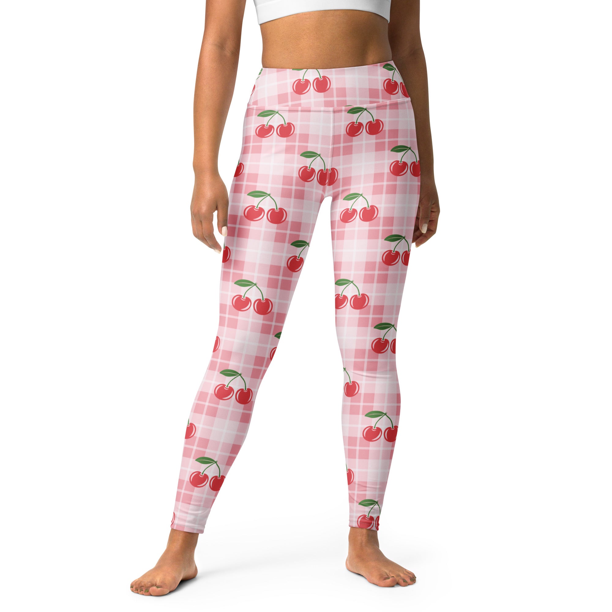 Women’s pink gingham cherry buttery soft yoga leggings with red cherry pattern and white plaid design