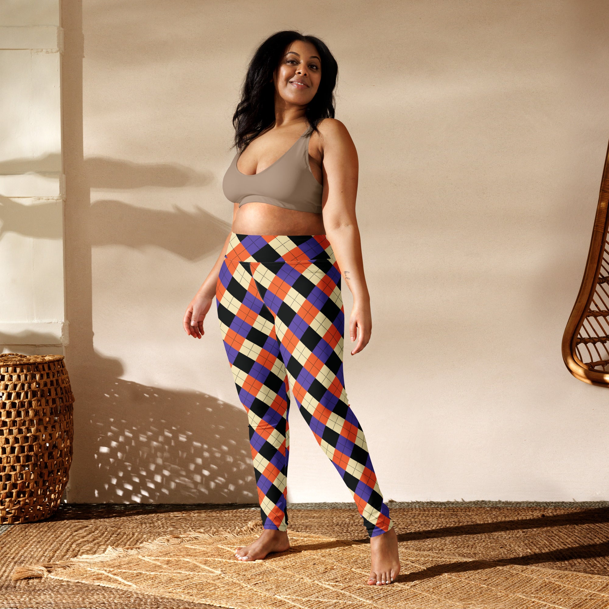 Women’s halloween argyle buttery soft yoga leggings in orange purple black and cream with a colorful pattern
