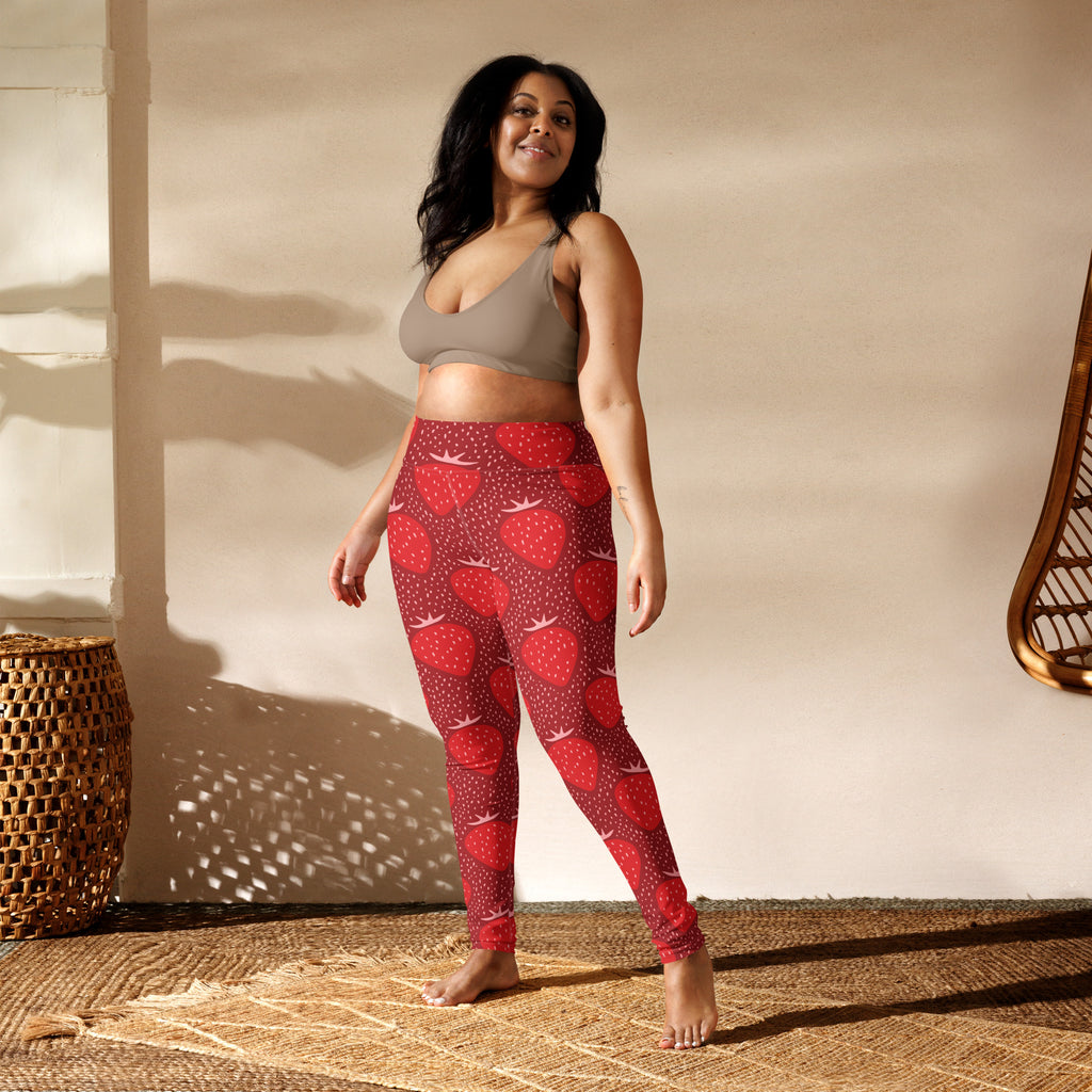 Red strawberry-patterned high-waisted buttery soft yoga leggings for women with dotted background
