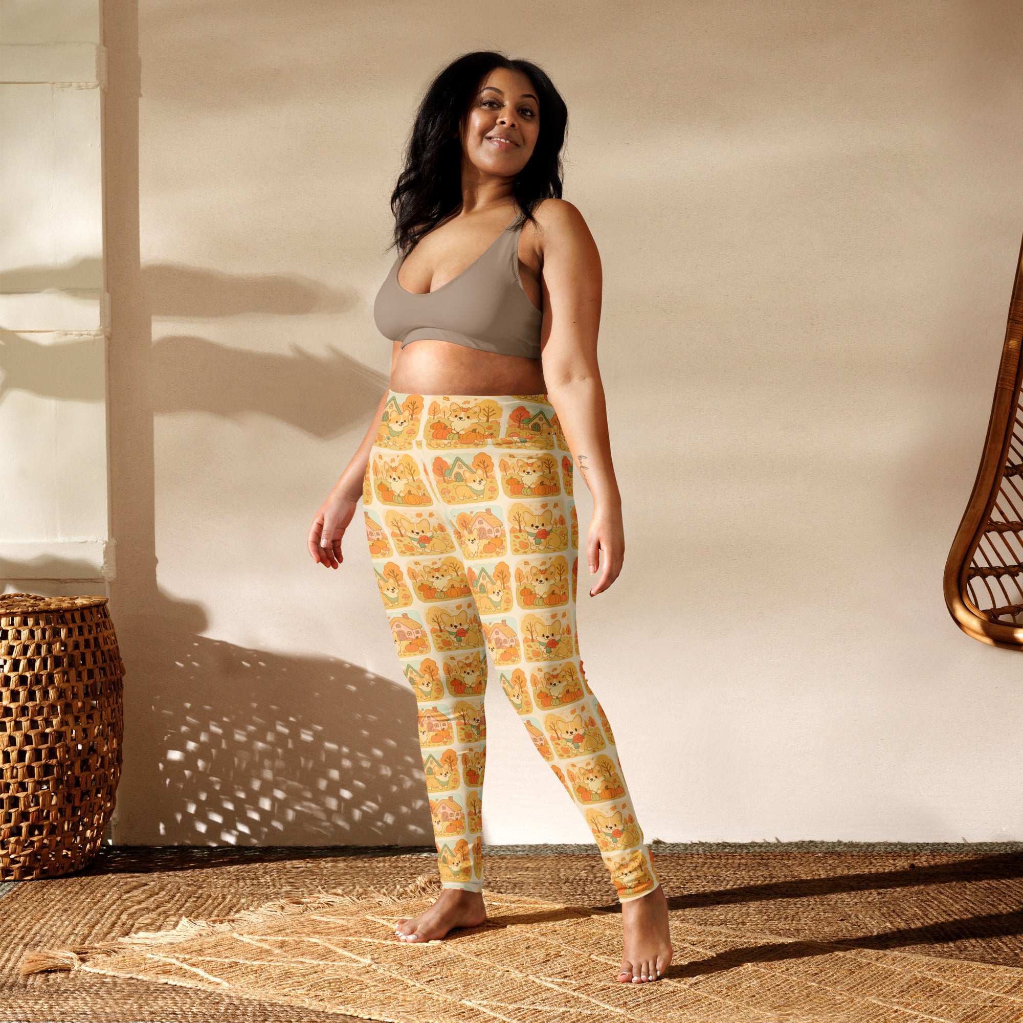 Yellow buttery soft women’s fall yoga leggings with cartoon corgi pattern in various poses and expressions