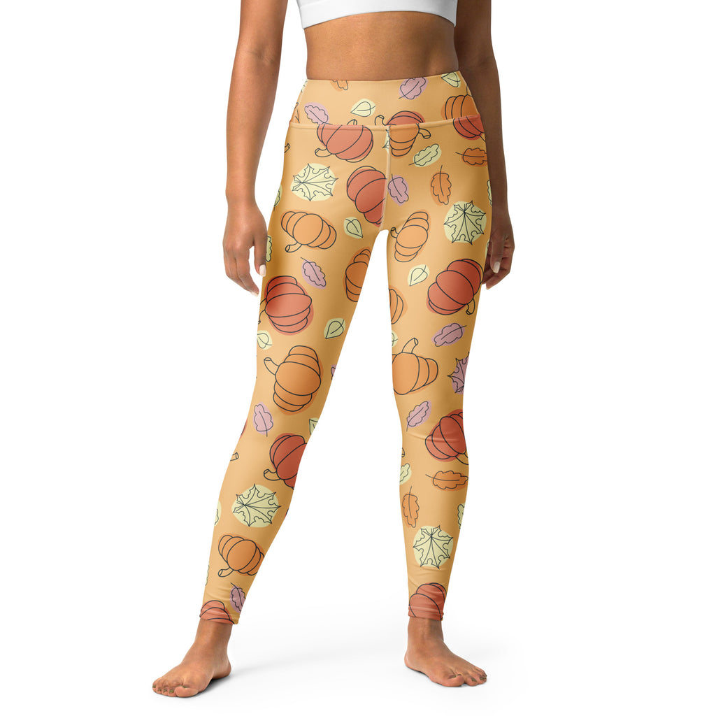 Cream-colored women’s pumpkin fall buttery soft yoga leggings with orange and purple pumpkins and green pink leaves pattern