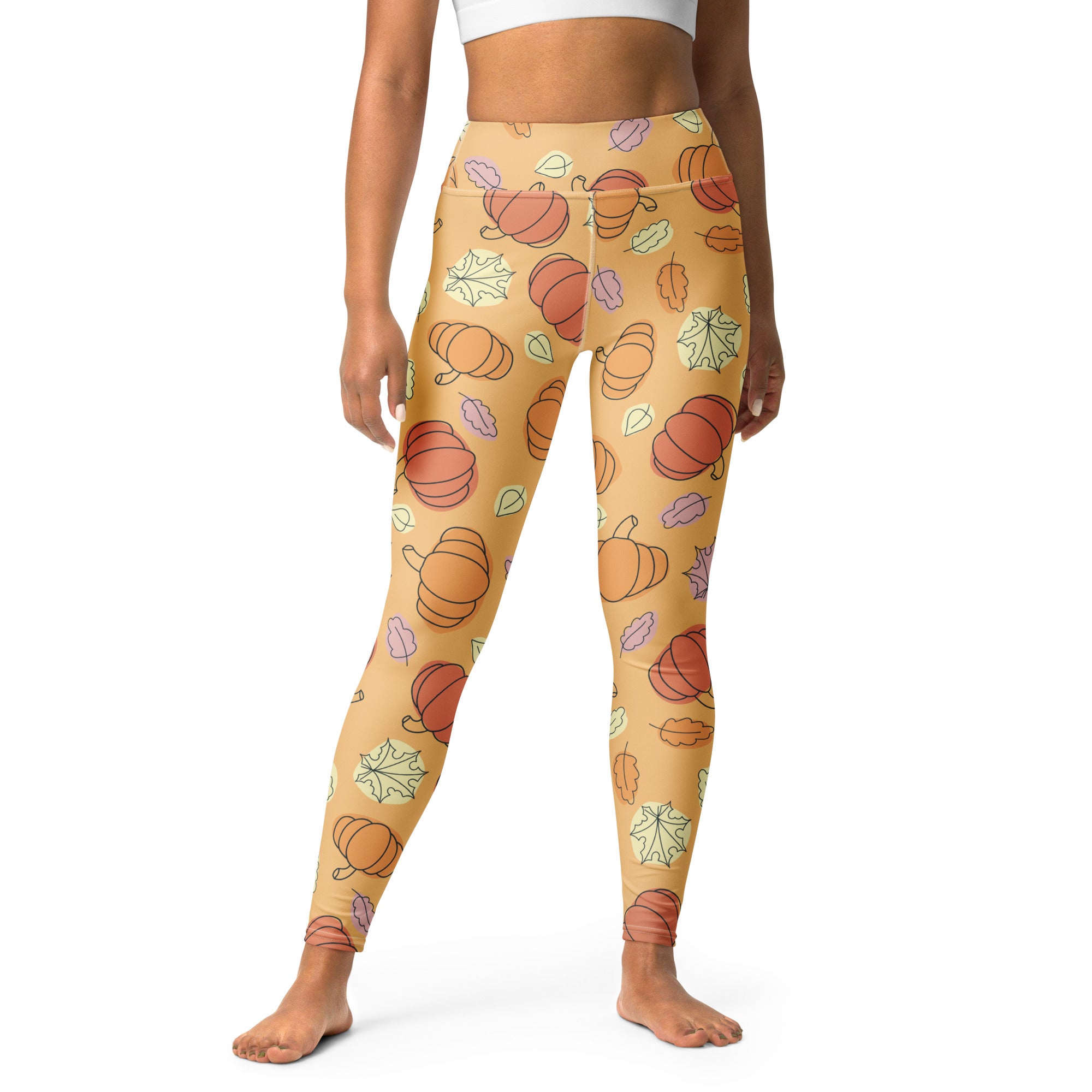 Cream-colored women’s pumpkin fall buttery soft yoga leggings with orange and purple pumpkins and green pink leaves pattern