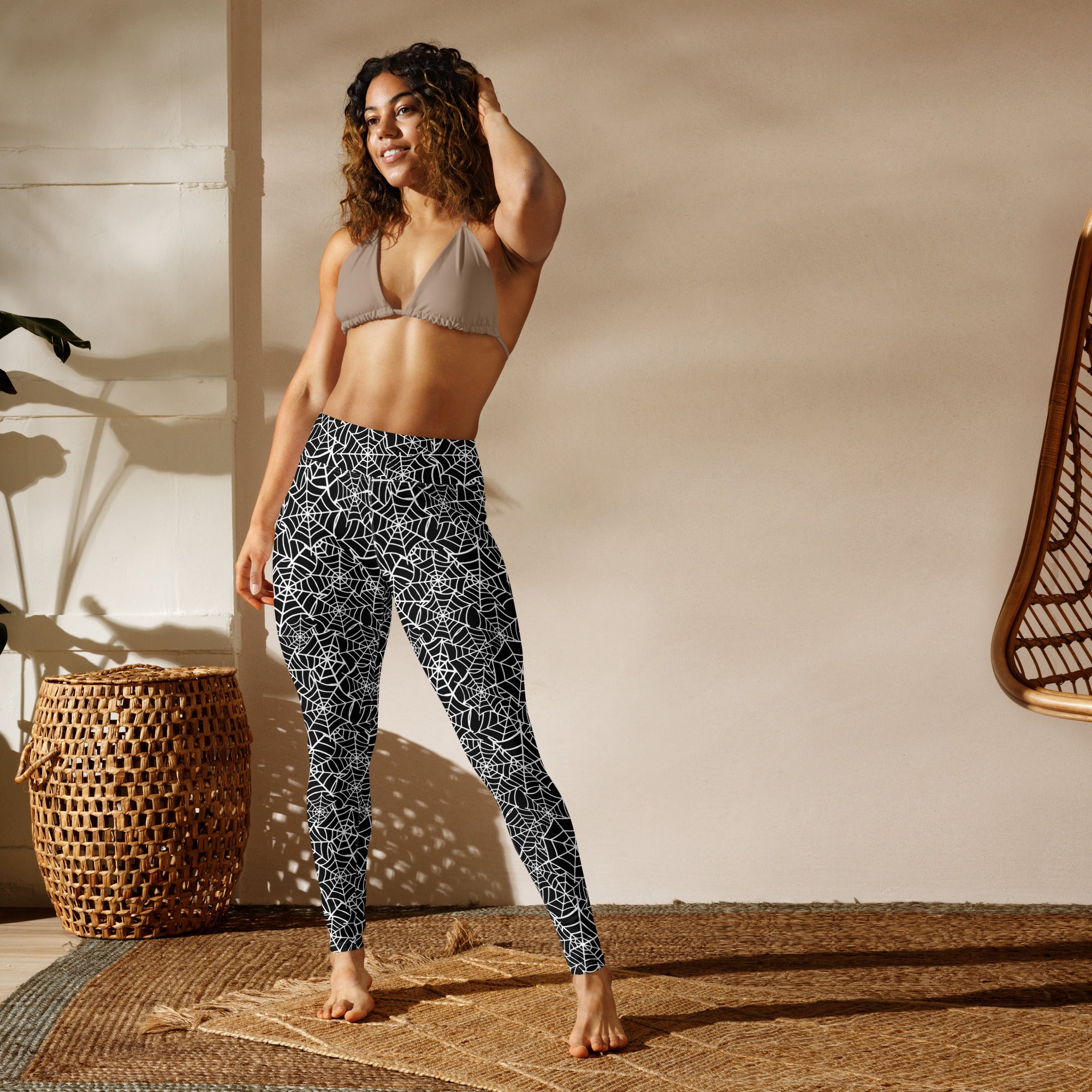 Women’s black and white spiderweb high-waisted buttery soft yoga leggings perfect for halloween workouts