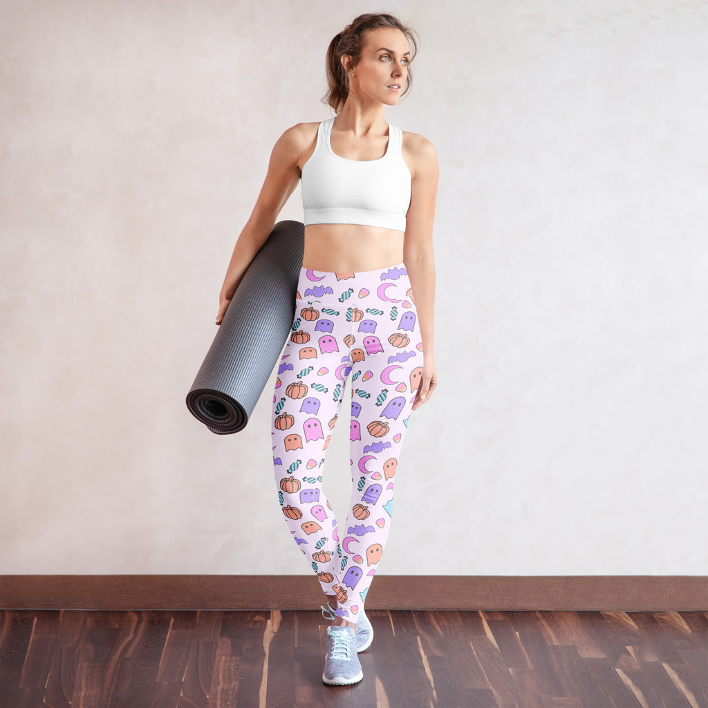White buttery soft women’s yoga leggings with pastel ghost pumpkin and candy cane halloween pattern