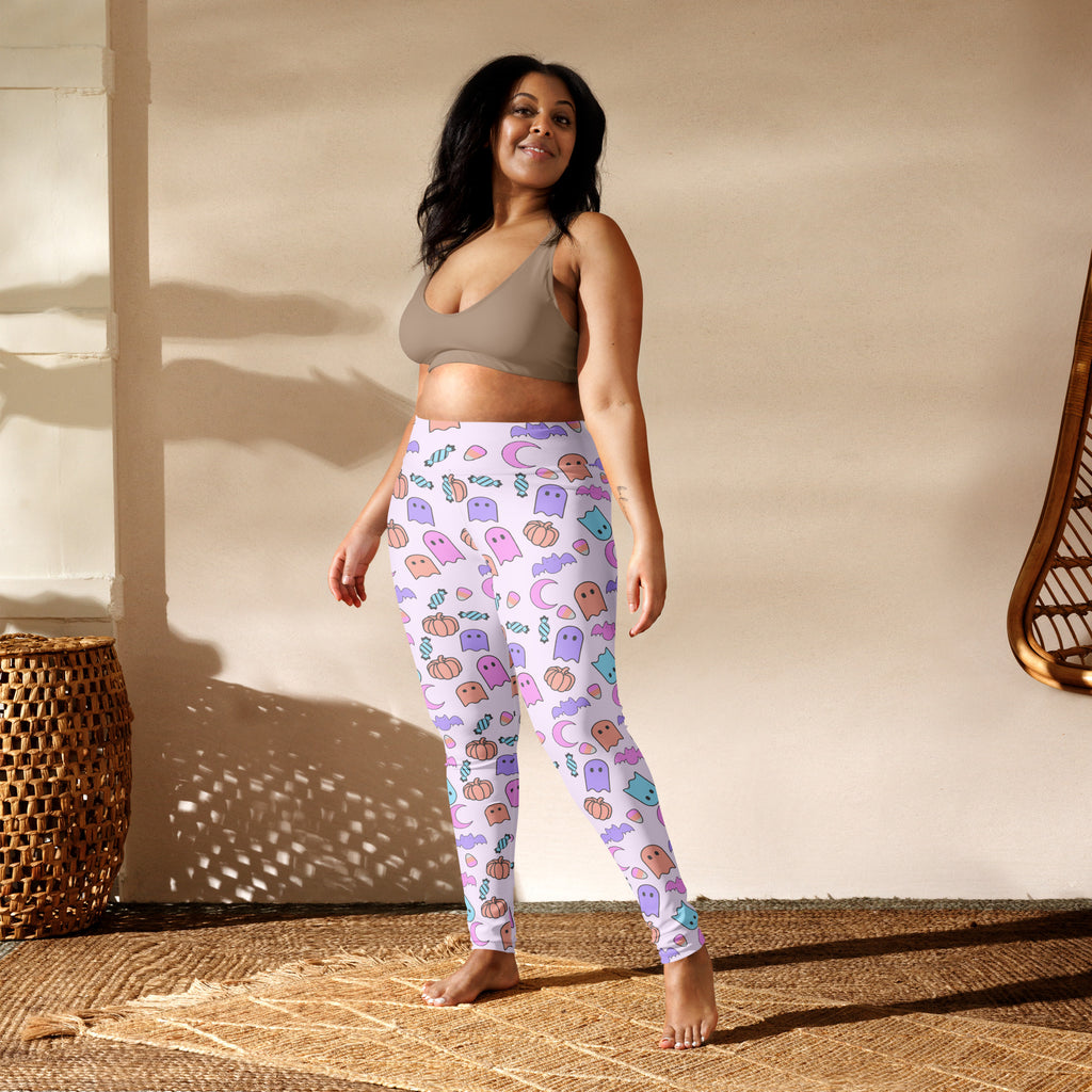 Women’s buttery soft white yoga leggings with pastel ghost pumpkin and moon pattern for Halloween wear