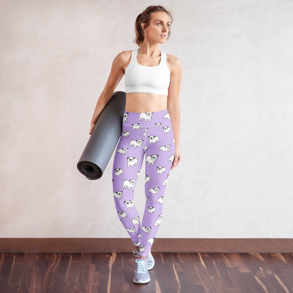 Women’s purple buttery soft yoga leggings with a repeating pattern of white pug illustrations