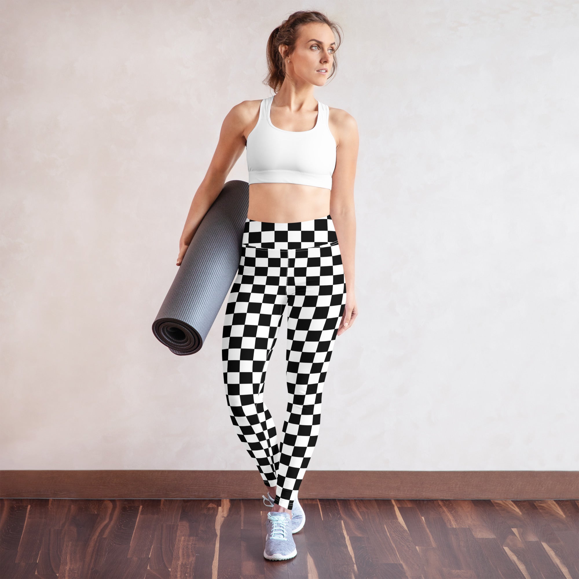 Women’s black and white checkered high waisted buttery soft yoga leggings shown from the back side