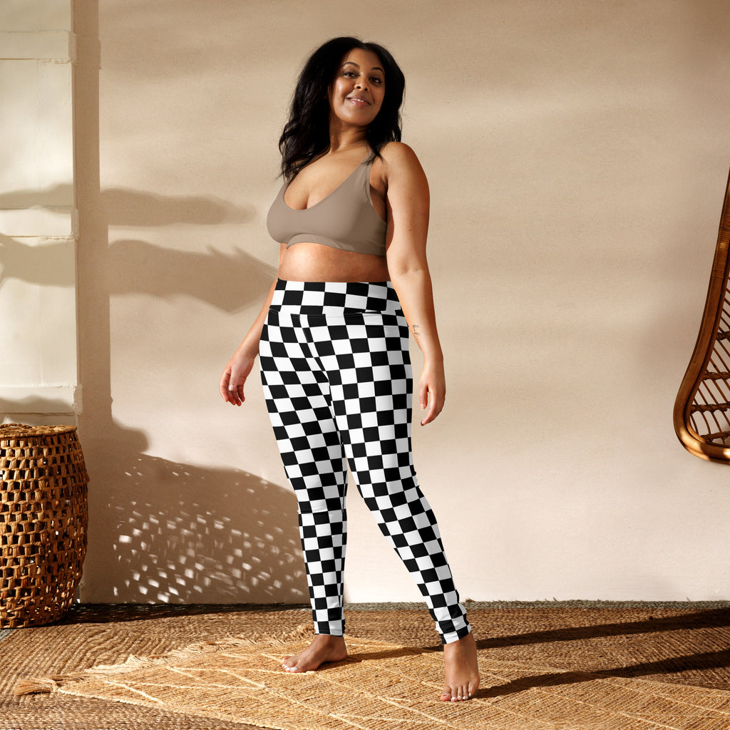 Women’s black and white checkered high-waisted buttery soft yoga leggings shown from the back side